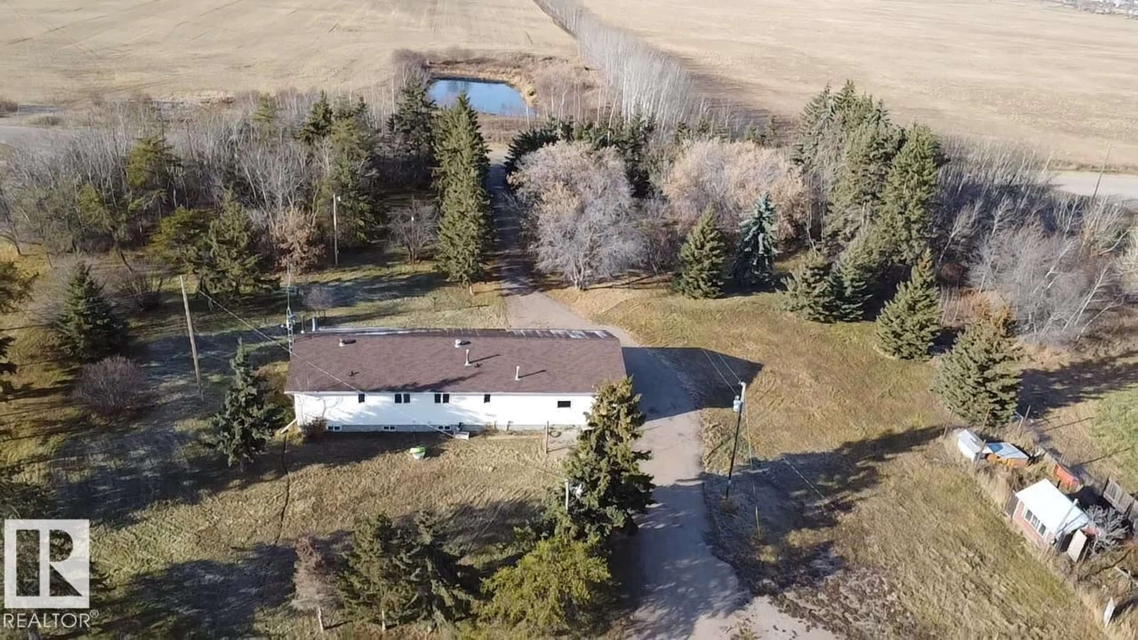 A pic from outside/outdoor area/front of a property/back of a property/a pic from drone, water/lake/river/ocean view for 61215 RGE RD 444, Rural Bonnyville M.D. Alberta T9N2J6