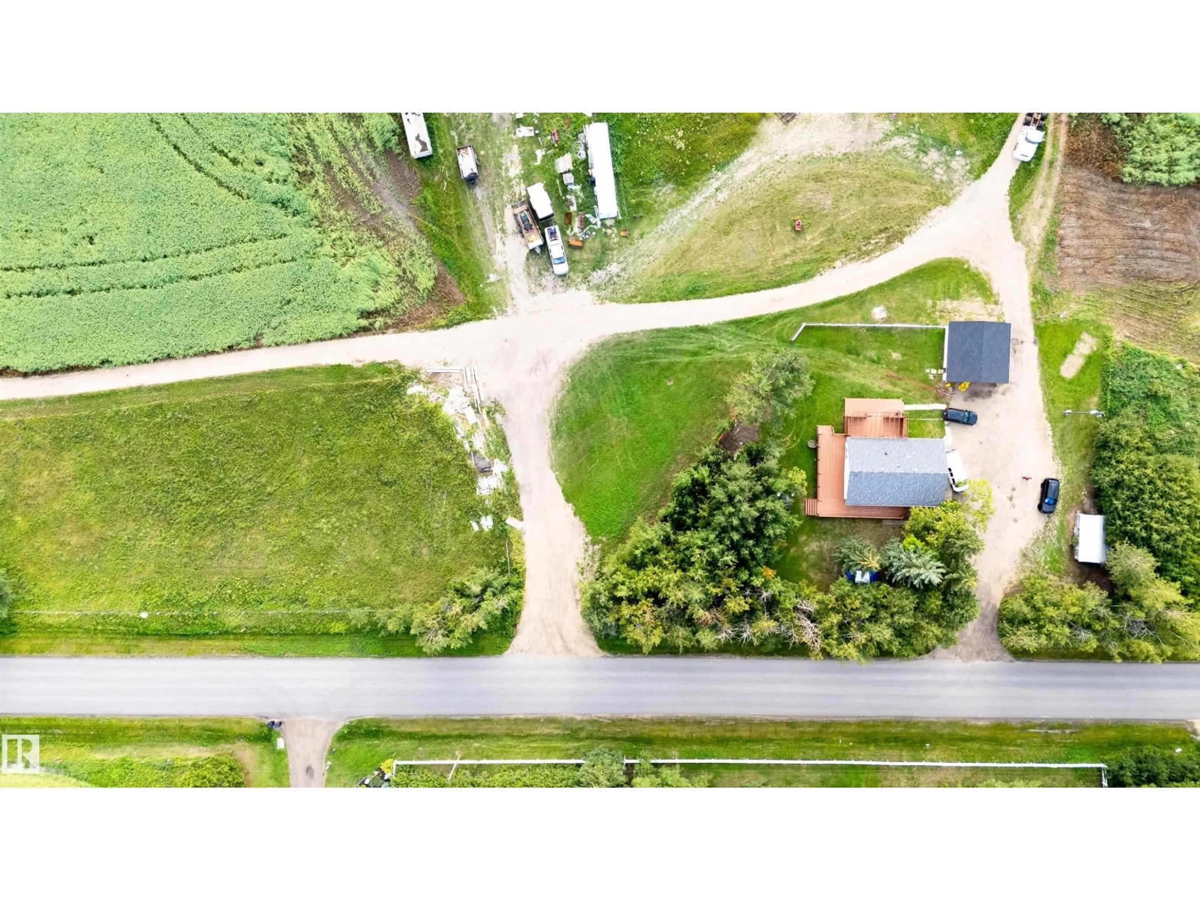 A pic from outside/outdoor area/front of a property/back of a property/a pic from drone, street for 52028 RGE ROAD 231, Rural Strathcona County Alberta T8B1A3
