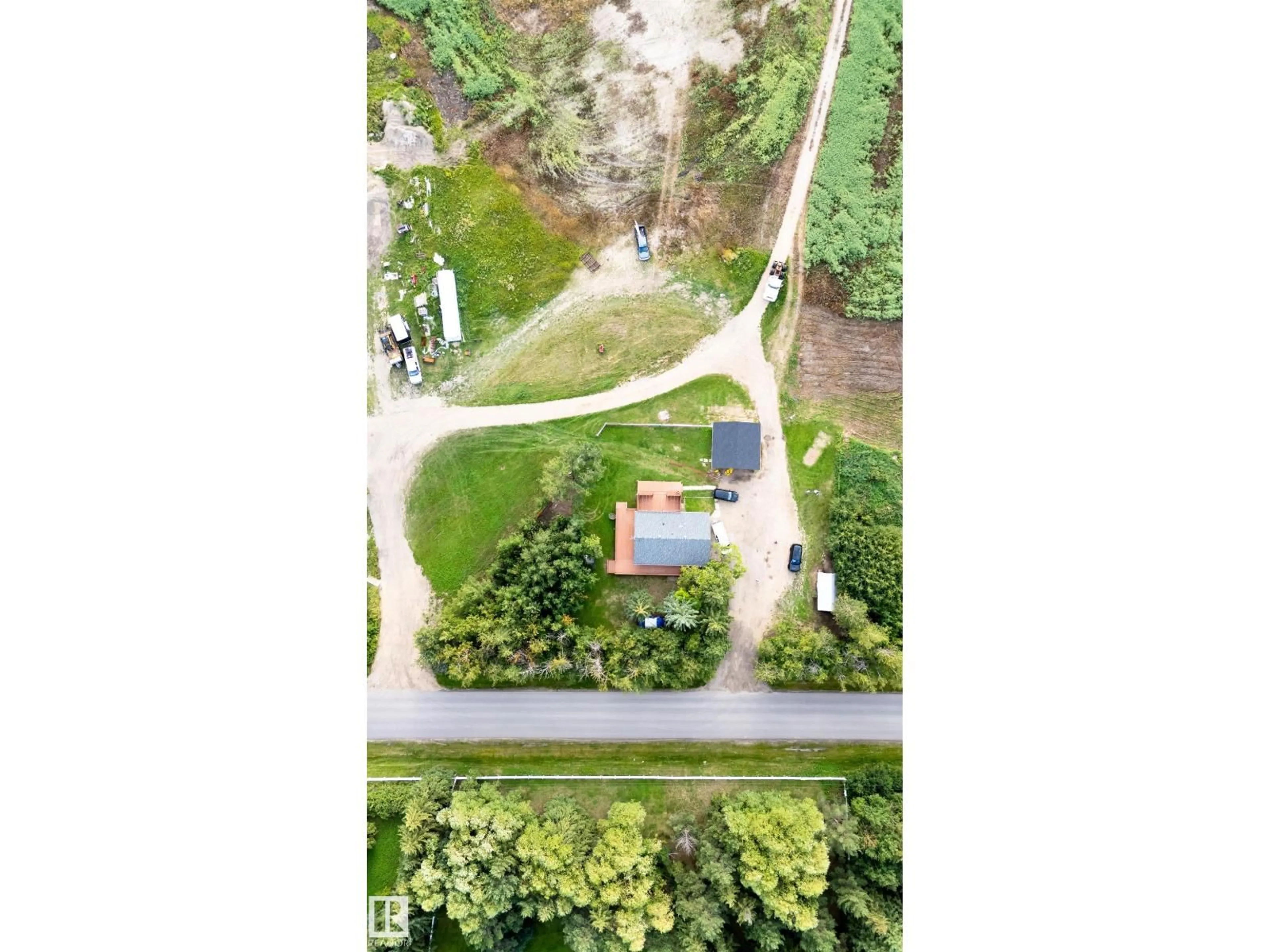 A pic from outside/outdoor area/front of a property/back of a property/a pic from drone, forest/trees view for 52028 RGE ROAD 231, Rural Strathcona County Alberta T8B1A3