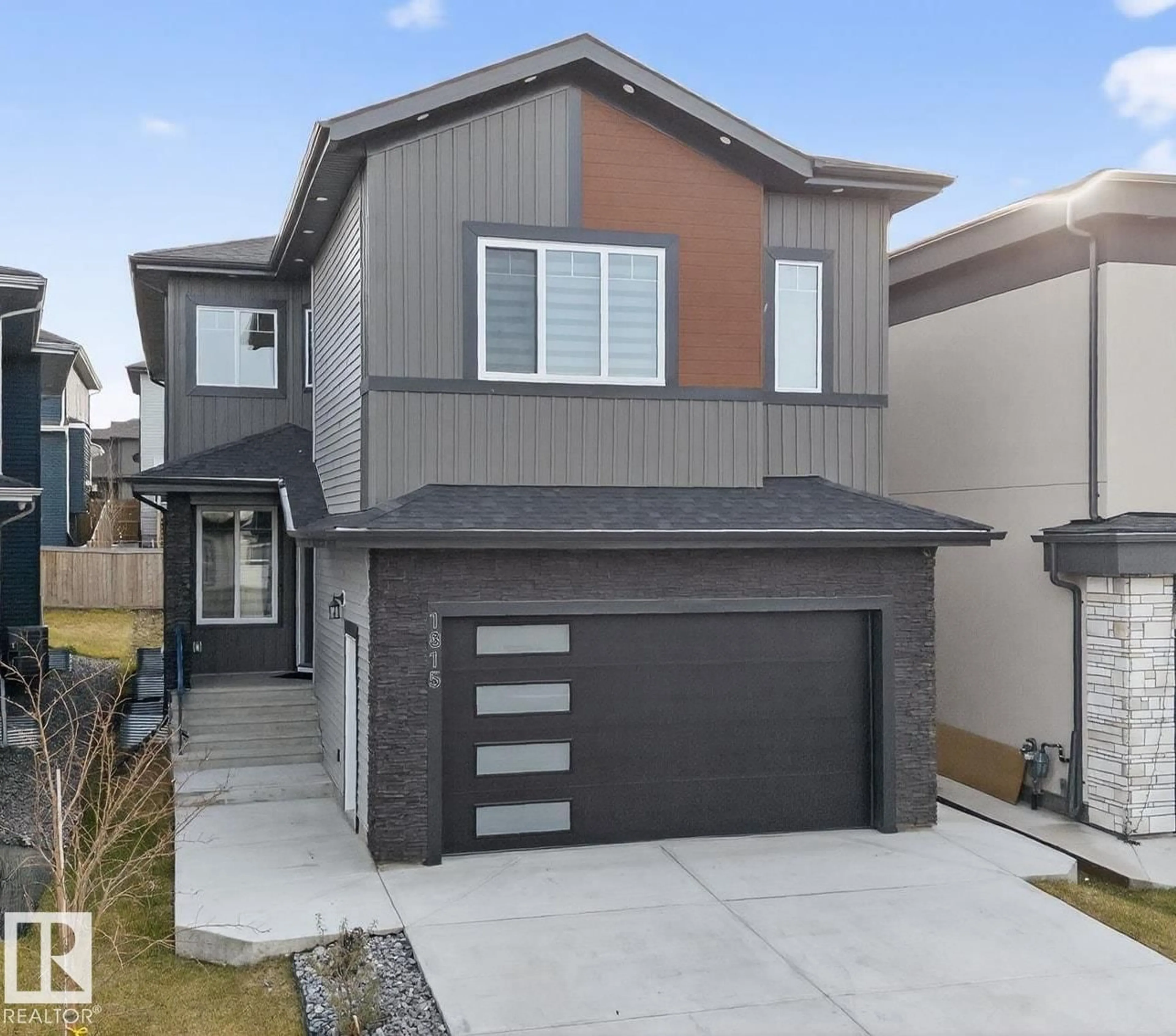Home with vinyl exterior material, street for 1815 17 AV, Edmonton Alberta T6T2N2