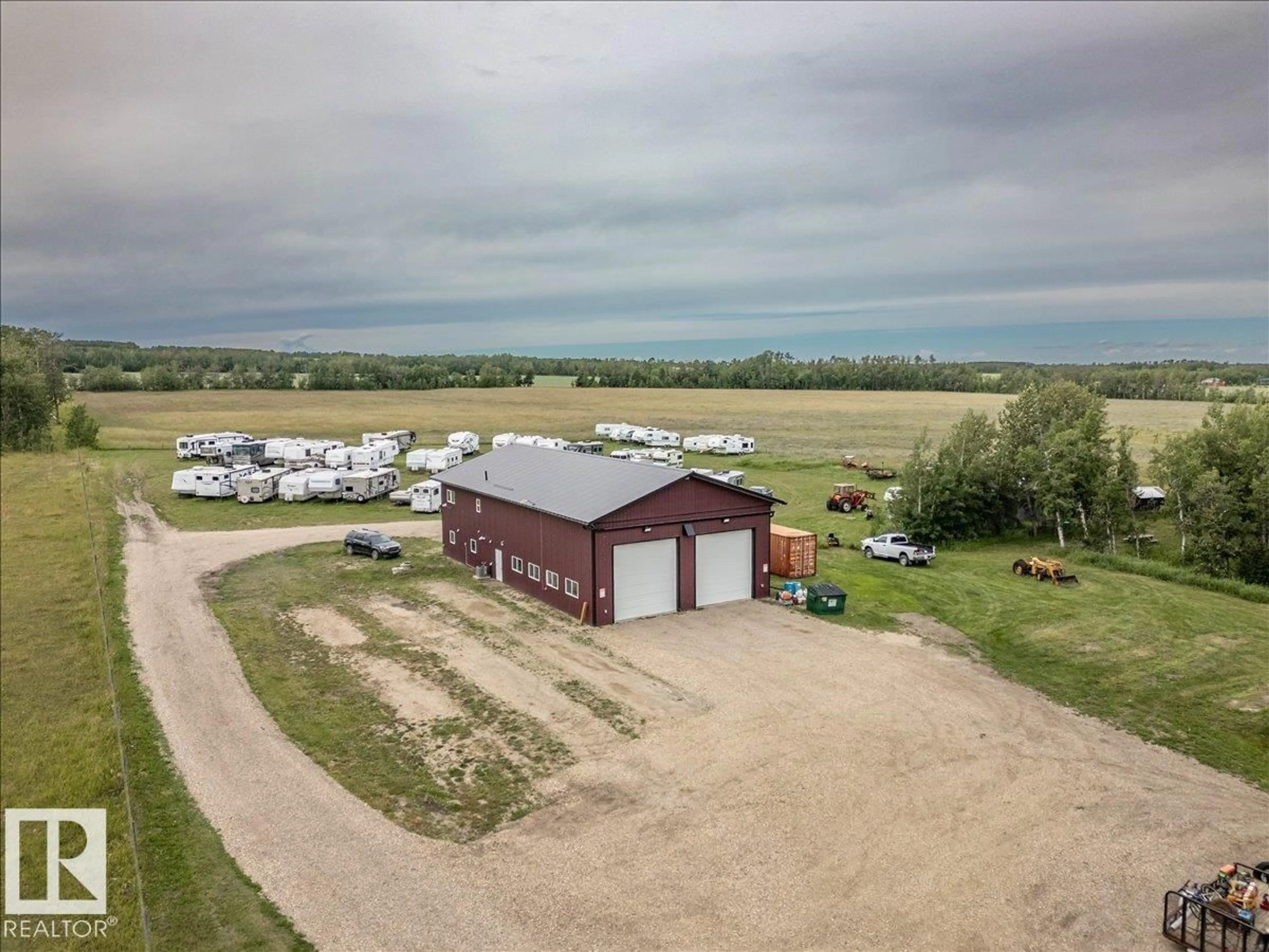 A pic from outside/outdoor area/front of a property/back of a property/a pic from drone, building for 48322 RGE ROAD 275, Rural Leduc County Alberta T0C0V0