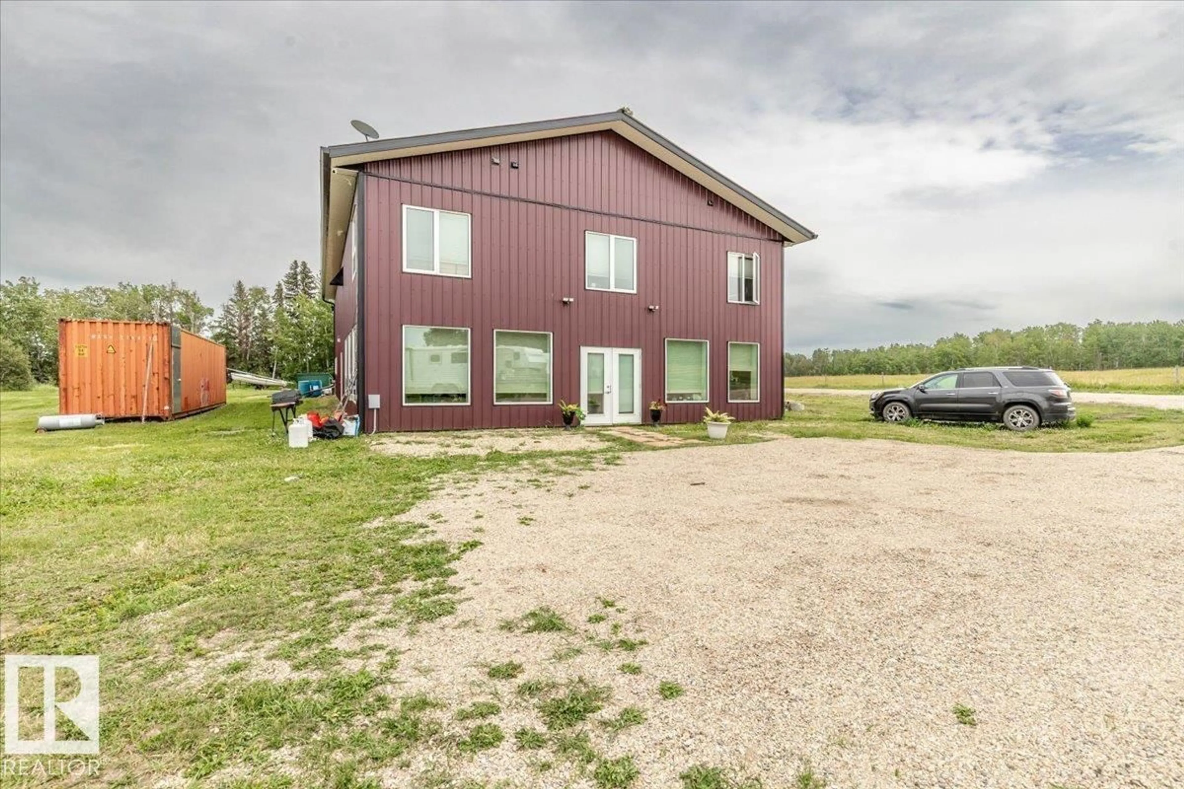 A pic from outside/outdoor area/front of a property/back of a property/a pic from drone, building for 48322 RGE ROAD 275, Rural Leduc County Alberta T0C0V0