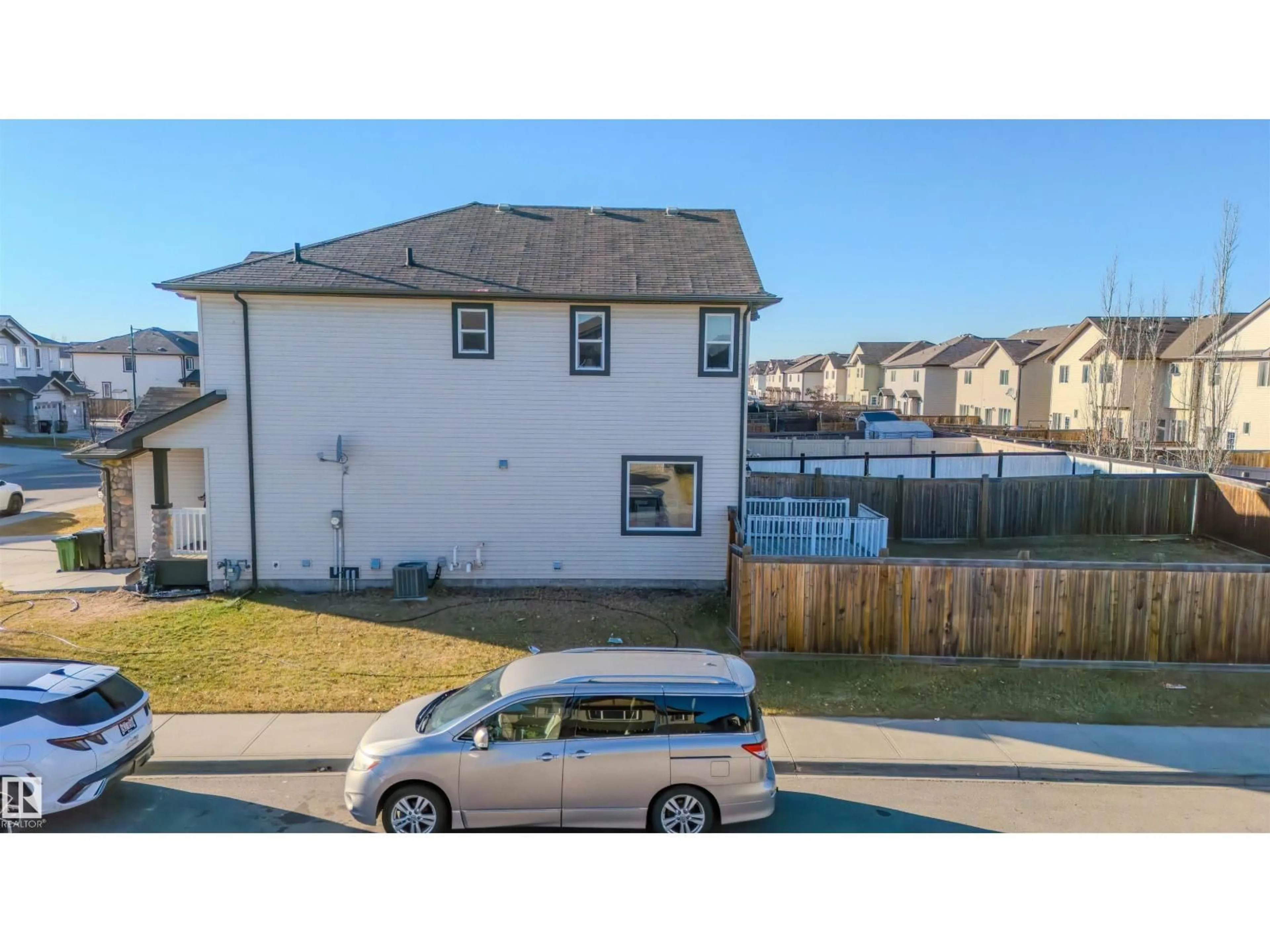 A pic from outside/outdoor area/front of a property/back of a property/a pic from drone, unknown for 2814 16A AV NW, Edmonton Alberta T6T0R7