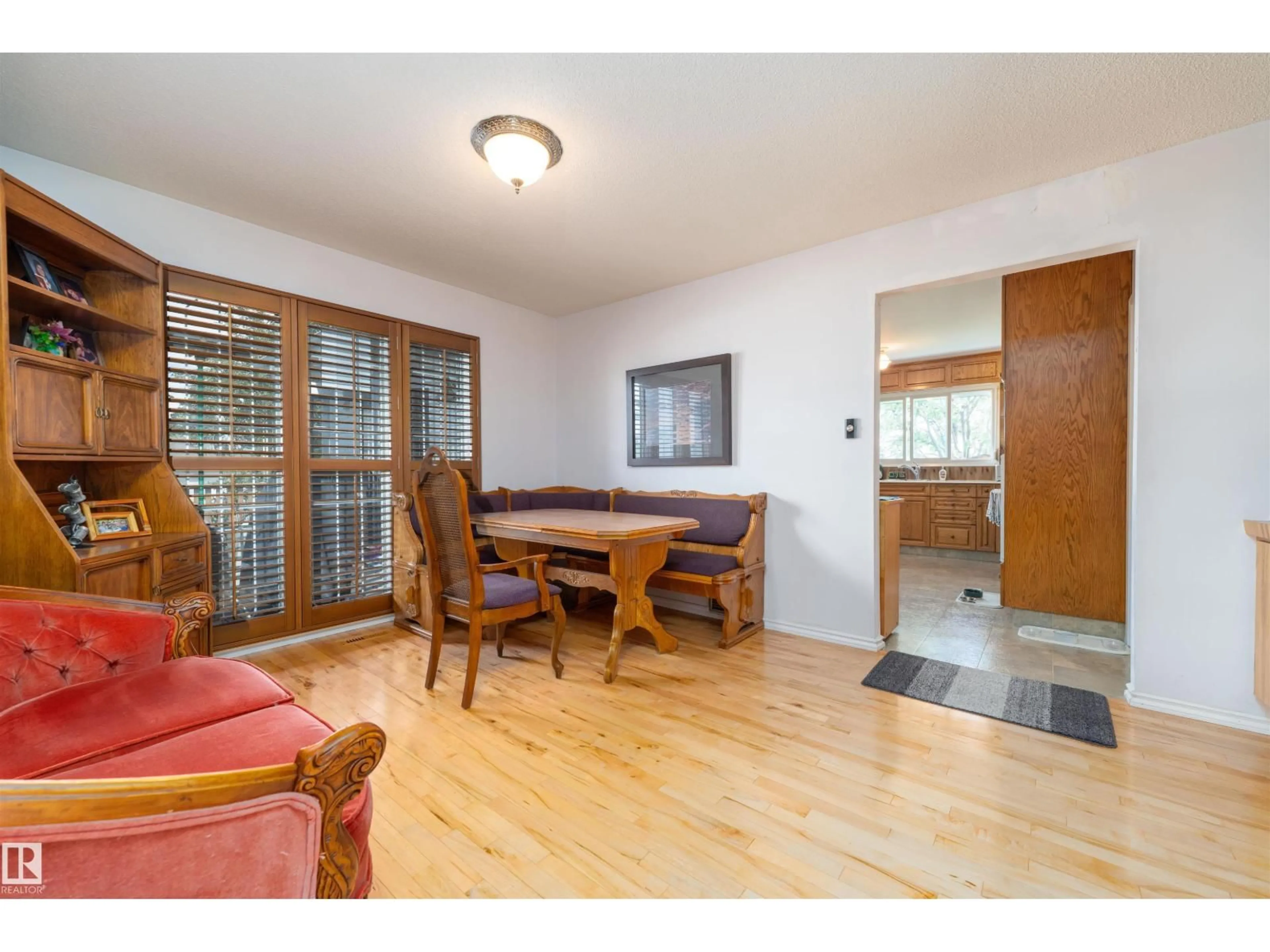 Dining room, wood/laminate floor for 7508 147 AV, Edmonton Alberta T5C2T2