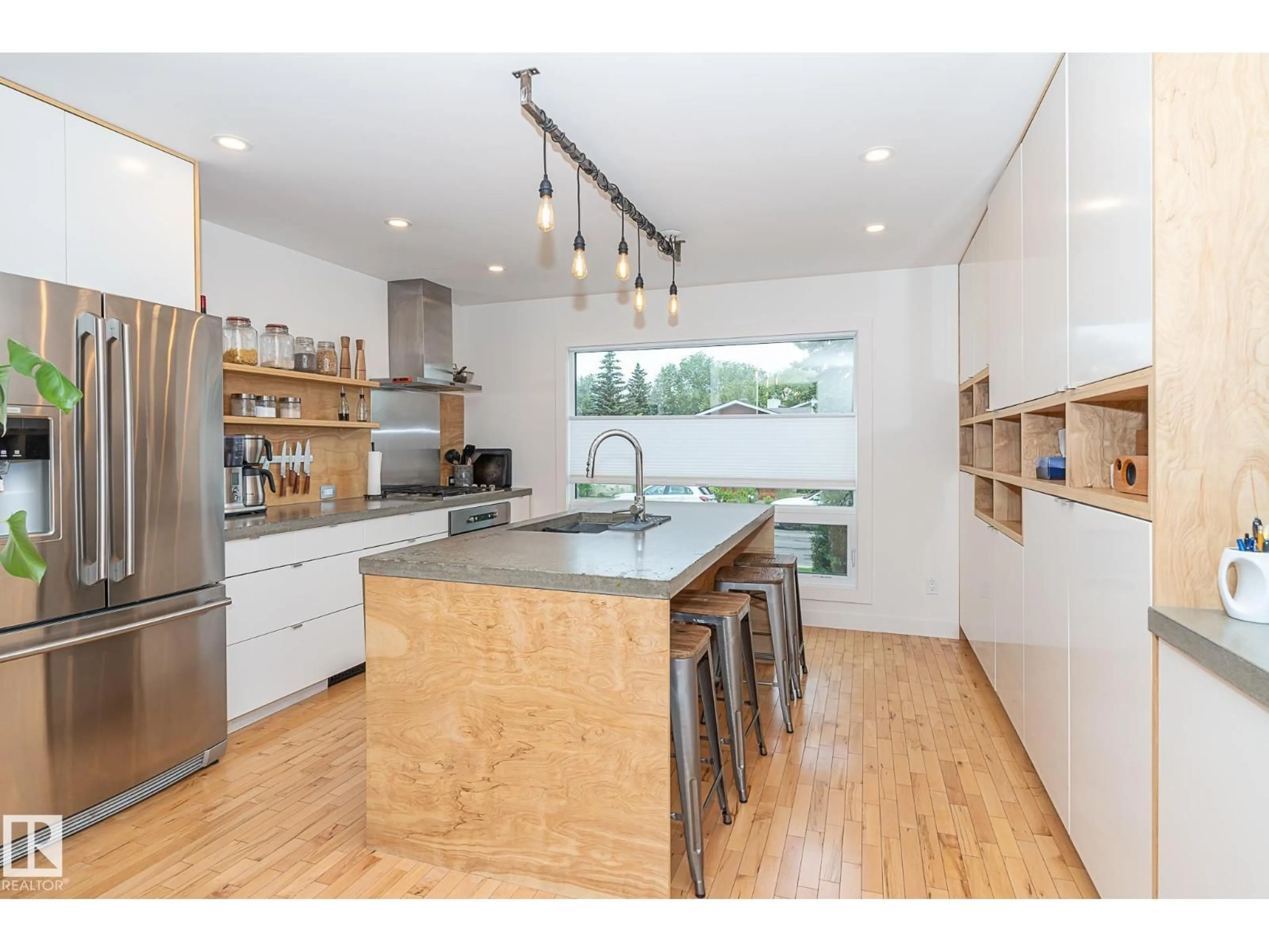 Open concept kitchen, wood/laminate floor for 12211 42A AV, Edmonton Alberta T6J0X5