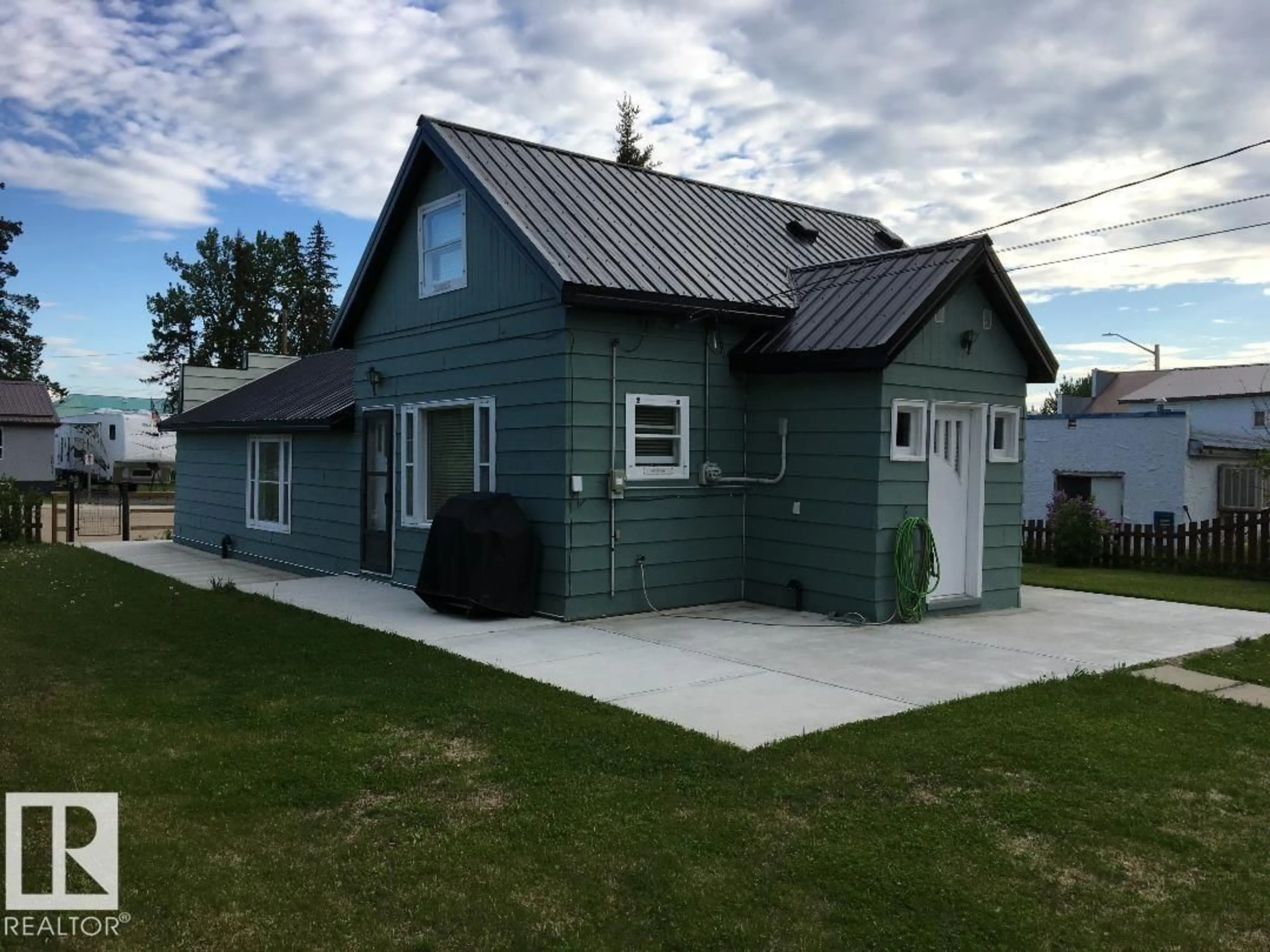 Home with vinyl exterior material, street for 5012 50 AV, Entwistle Alberta T0E0S0