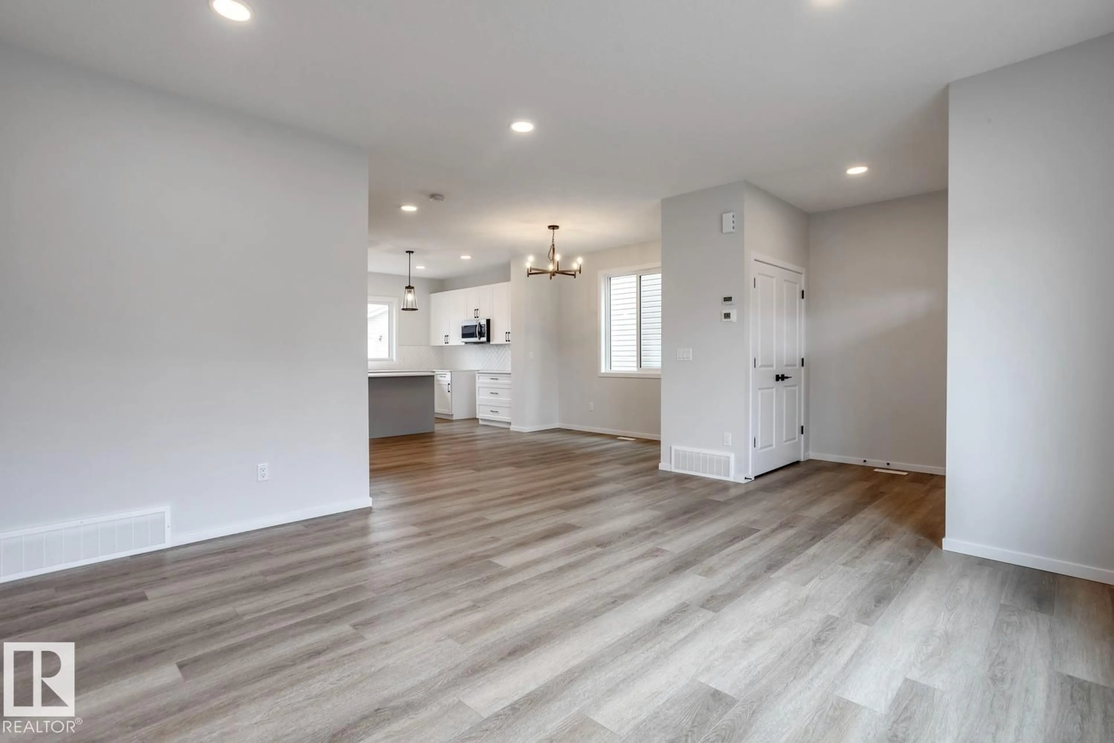 Open concept kitchen, wood/laminate floor for 10 HUNTER PL, Spruce Grove Alberta T7X3W3