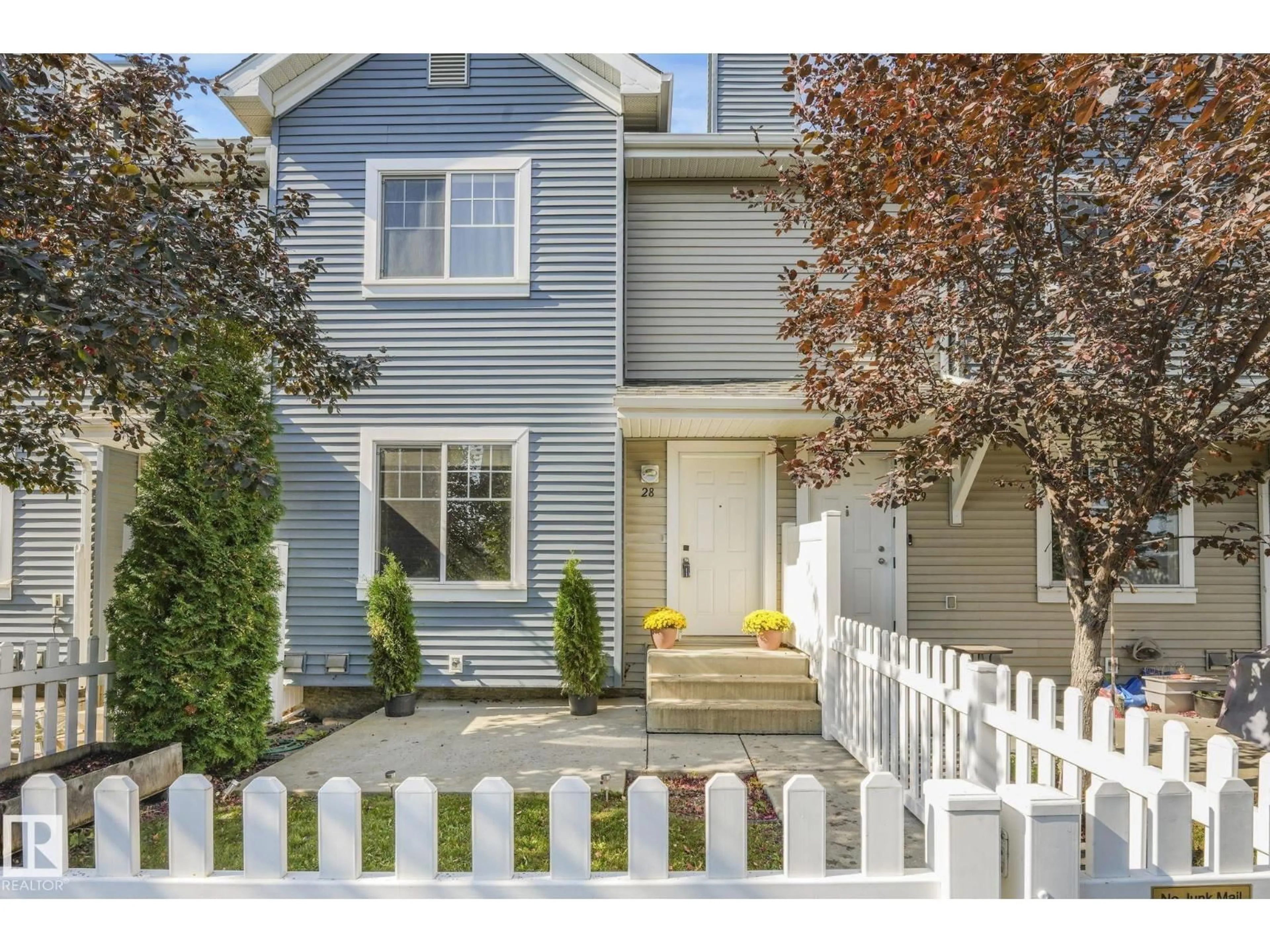 Home with vinyl exterior material, street for 8304 - 28 11 AV, Edmonton Alberta T6X1J8