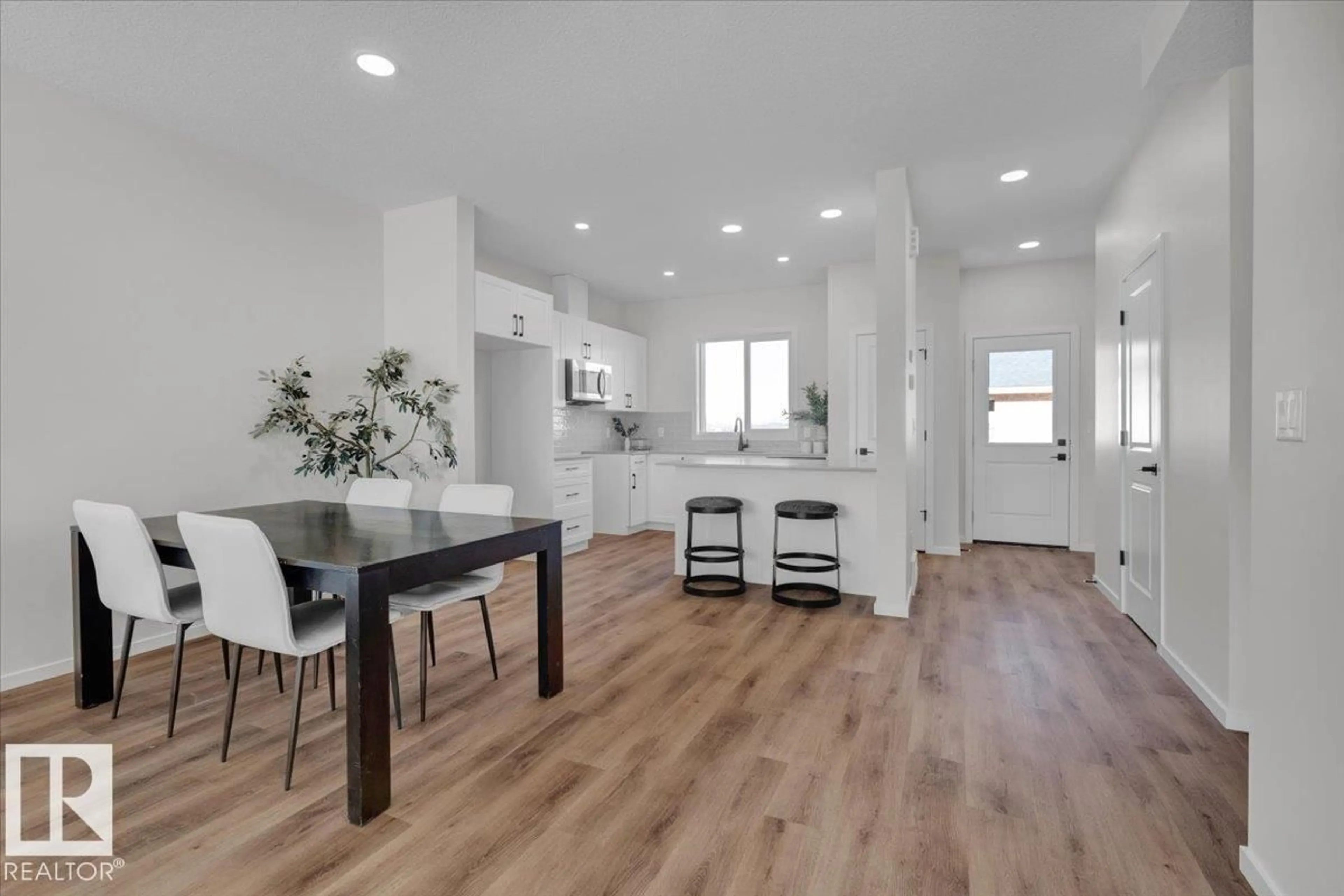 Open concept kitchen, wood/laminate floor for 85 BRICKYARD DR, Stony Plain Alberta T7Z0P2