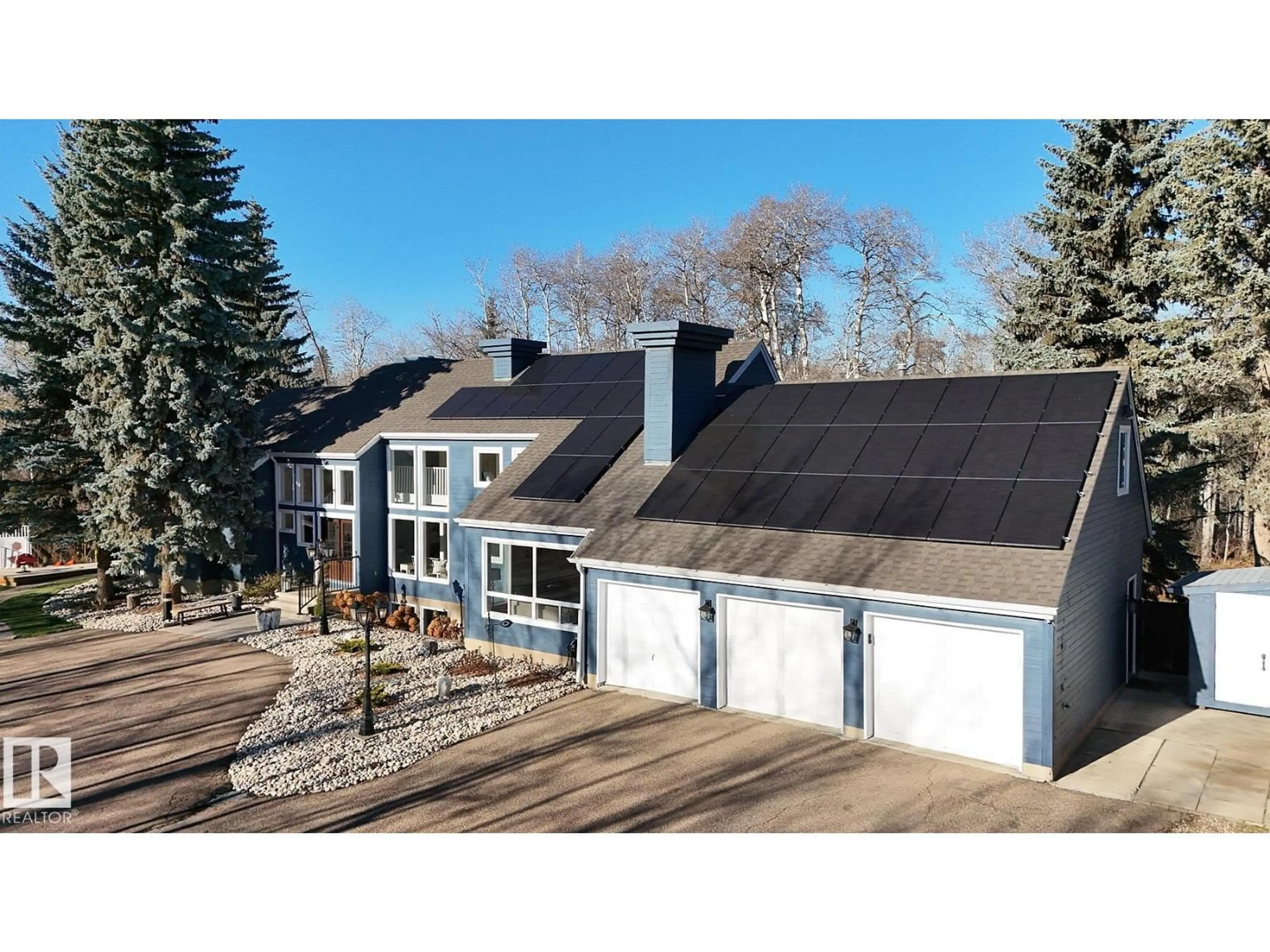 A pic from outside/outdoor area/front of a property/back of a property/a pic from drone, unknown for 14 - 52210 RGE ROAD 232, Rural Strathcona County Alberta T8B1B9