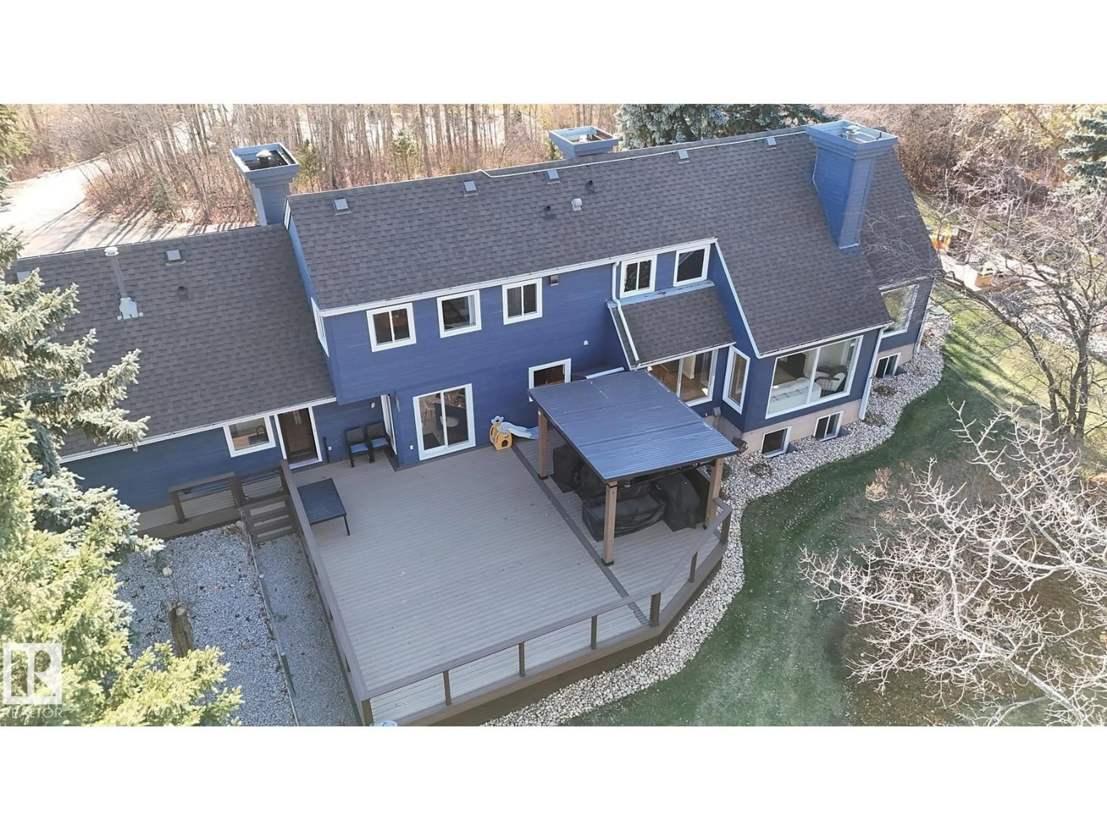 A pic from outside/outdoor area/front of a property/back of a property/a pic from drone, building for 14 - 52210 RGE ROAD 232, Rural Strathcona County Alberta T8B1B9