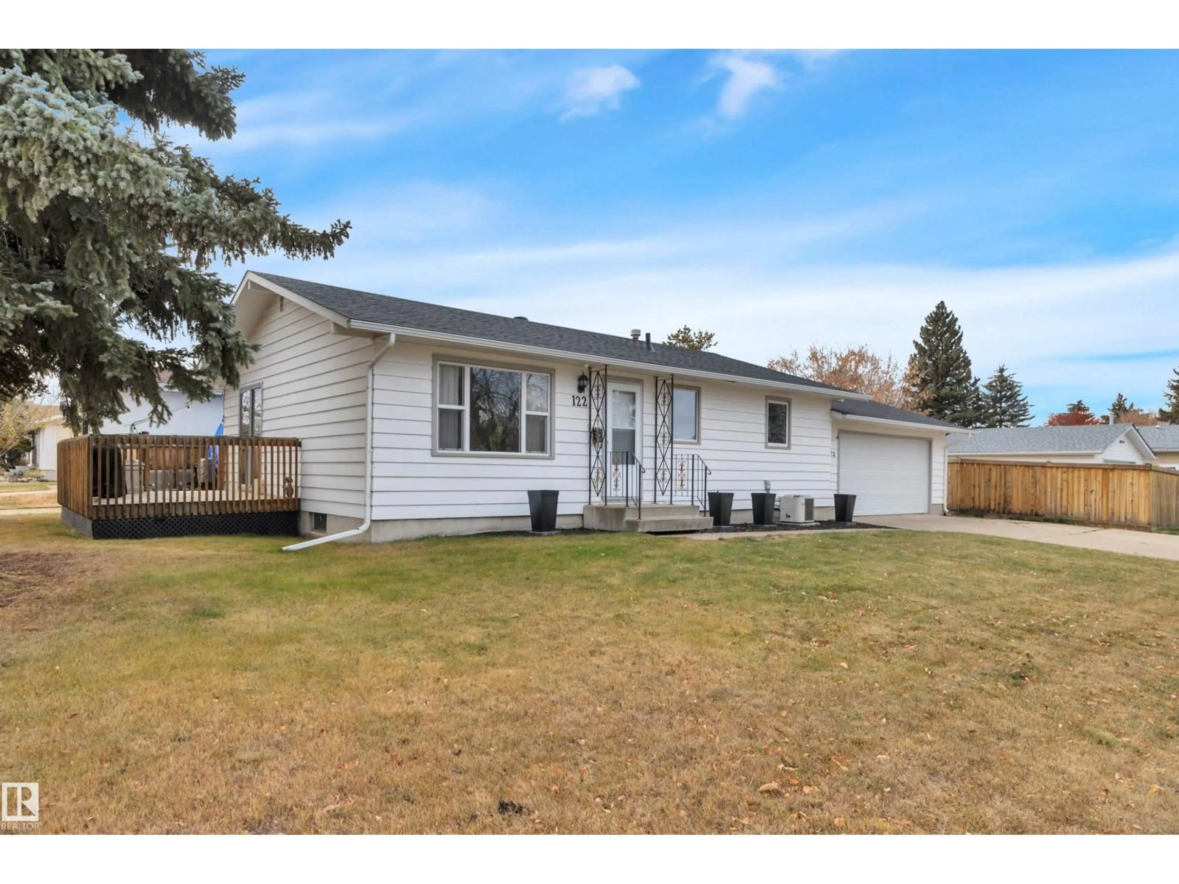 Home with vinyl exterior material, street for 122 MAPLE CR, Wetaskiwin Alberta T9A2E4