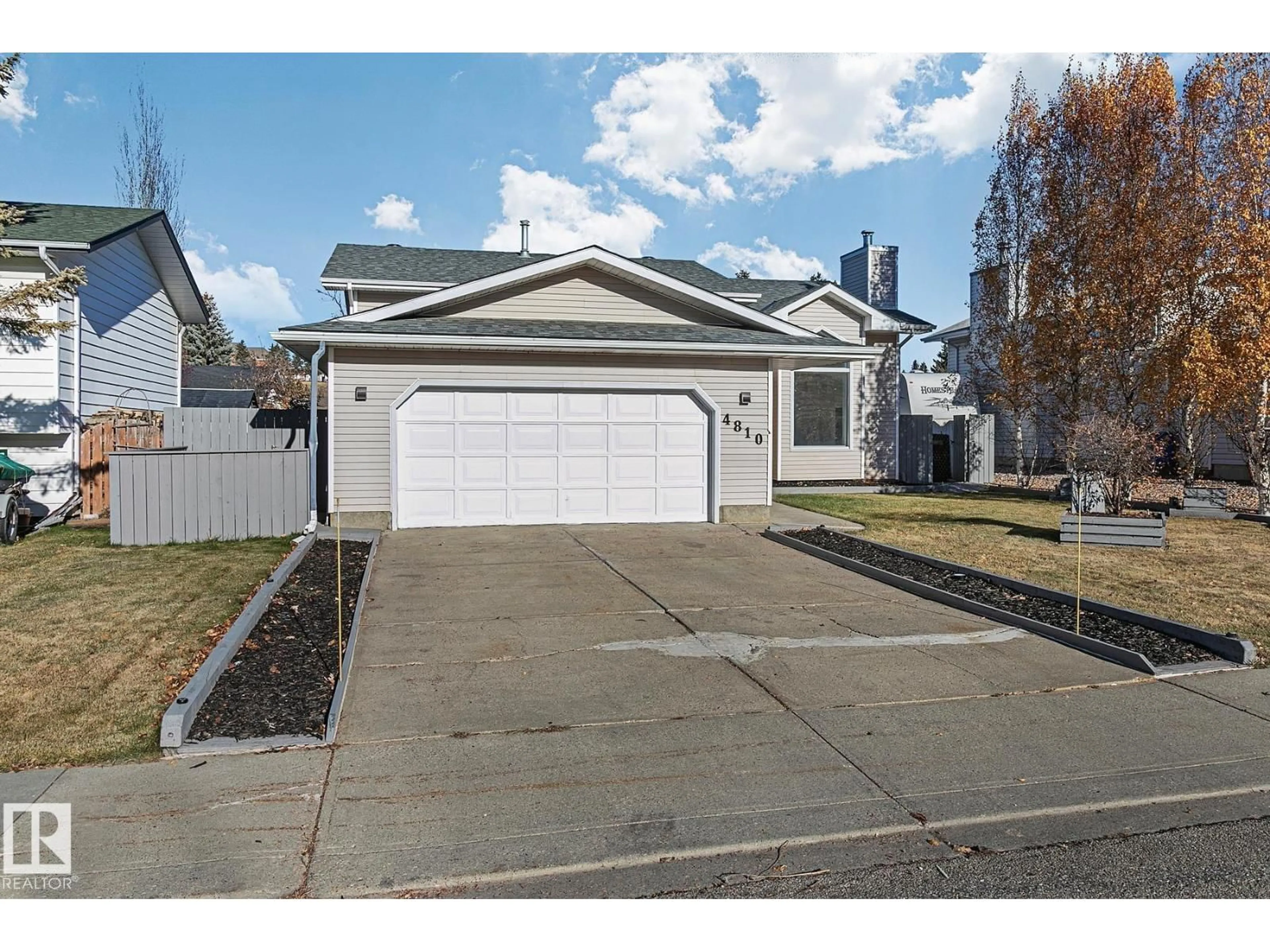 Home with vinyl exterior material, street for 4810 44 AV, Beaumont Alberta T4X1G3