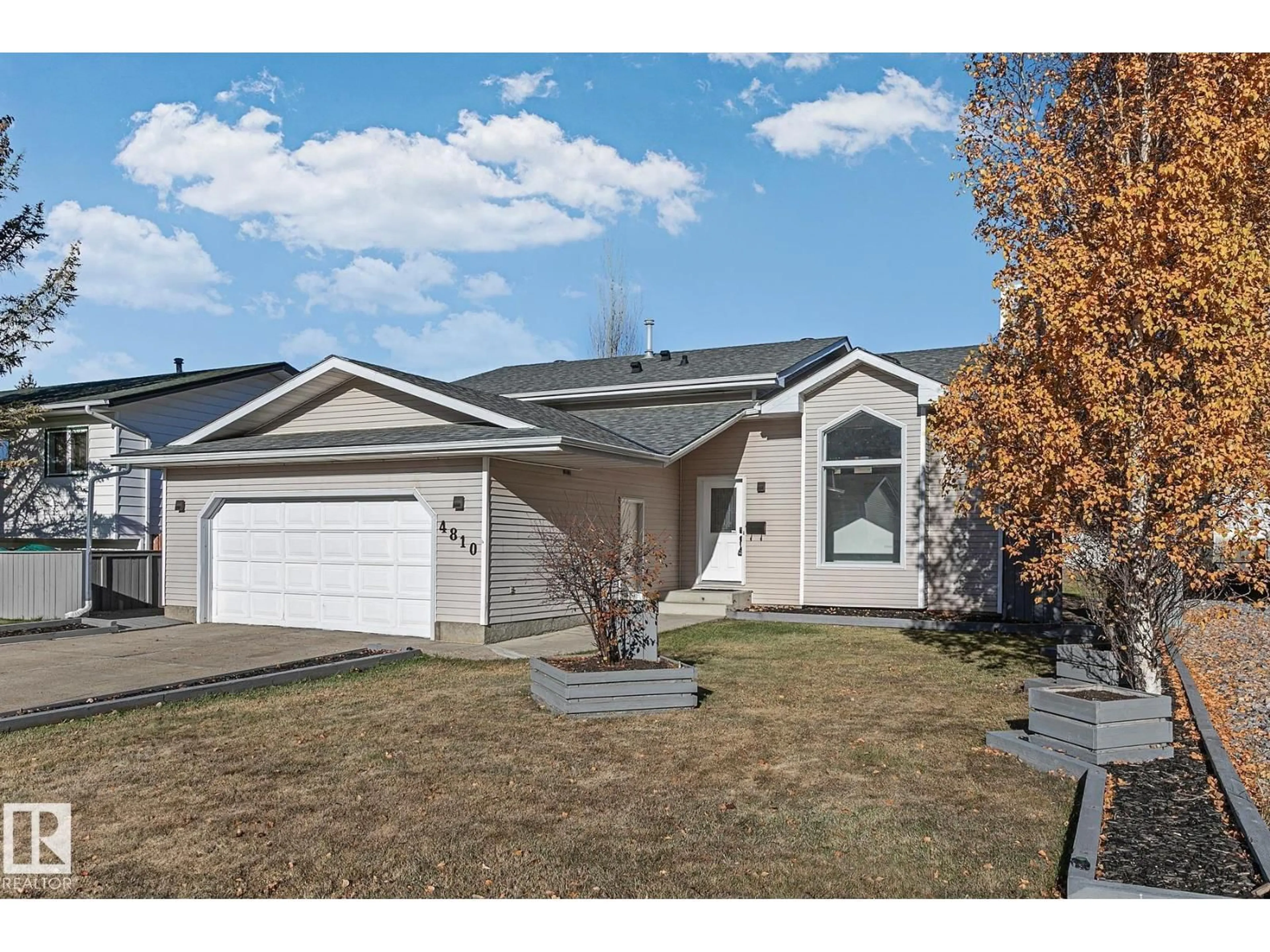 Home with vinyl exterior material, street for 4810 44 AV, Beaumont Alberta T4X1G3