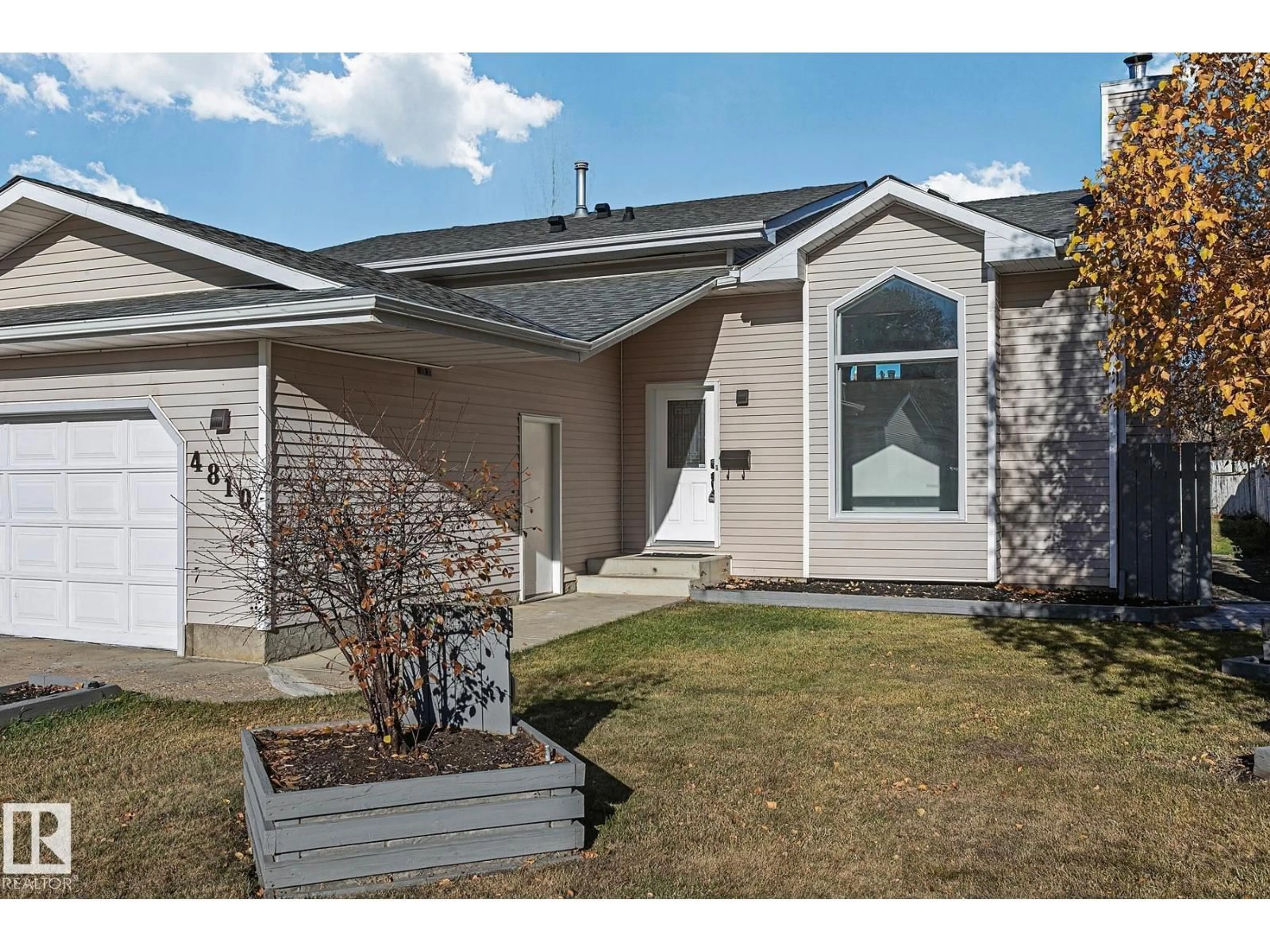 Home with vinyl exterior material, street for 4810 44 AV, Beaumont Alberta T4X1G3