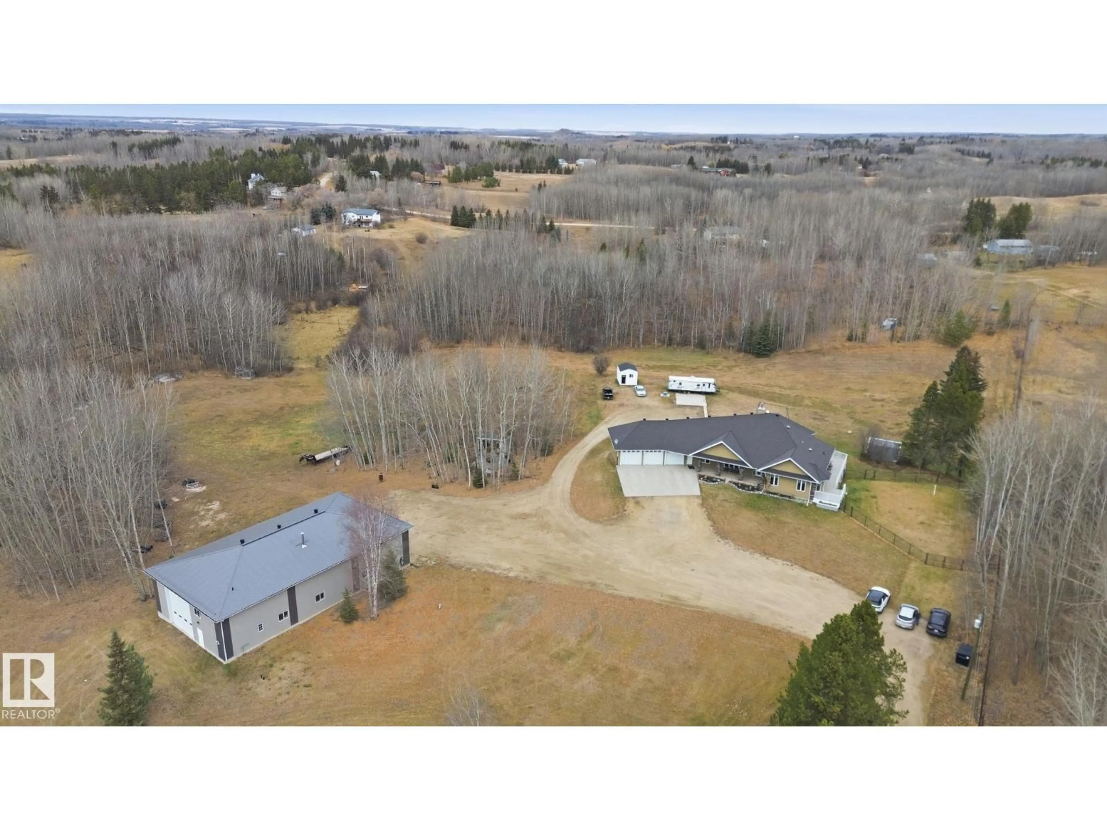 A pic from outside/outdoor area/front of a property/back of a property/a pic from drone, unknown for 2012 PARKLAND DR, Rural Parkland County Alberta T7Y2S1