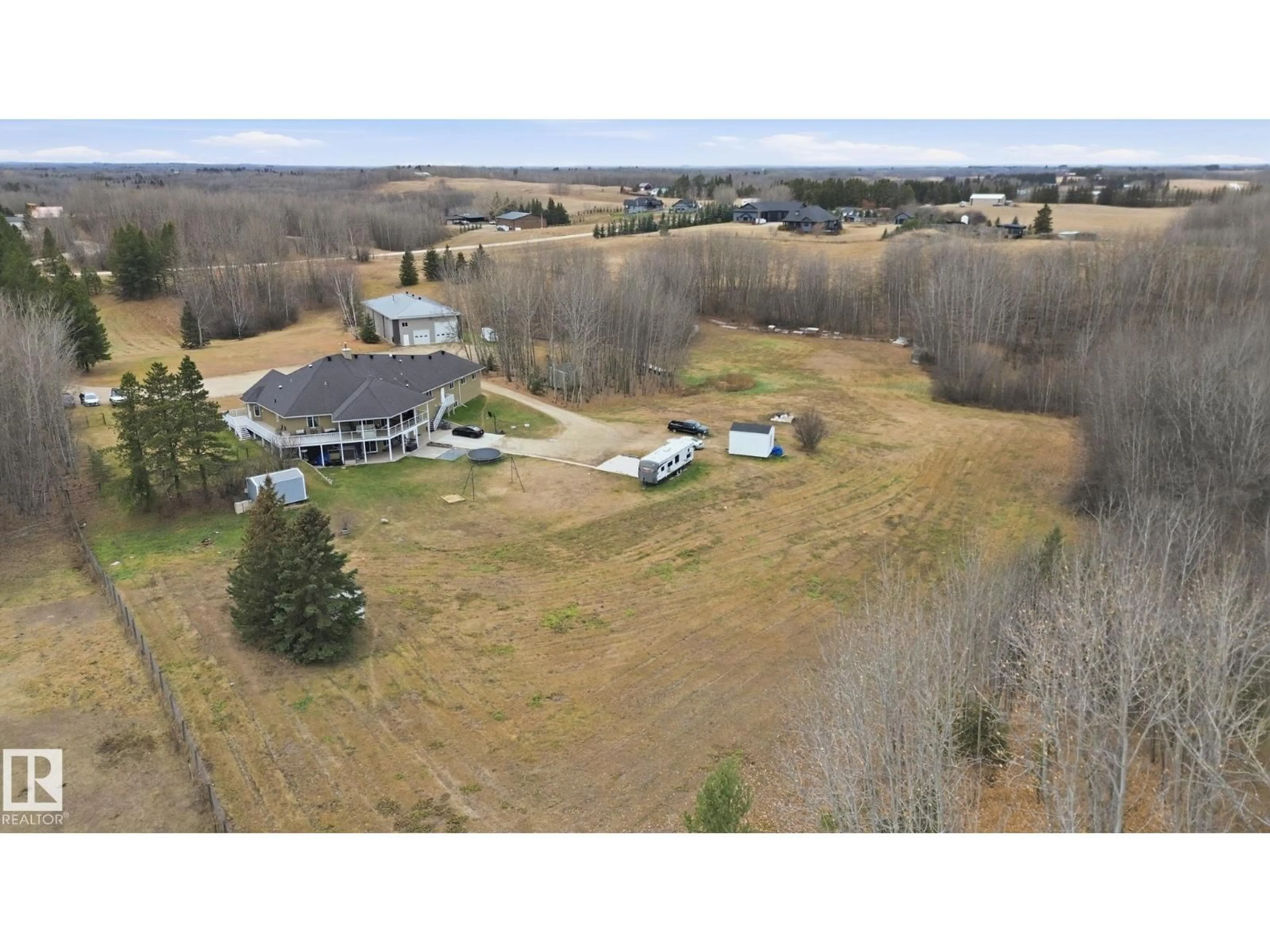 A pic from outside/outdoor area/front of a property/back of a property/a pic from drone, unknown for 2012 PARKLAND DR, Rural Parkland County Alberta T7Y2S1