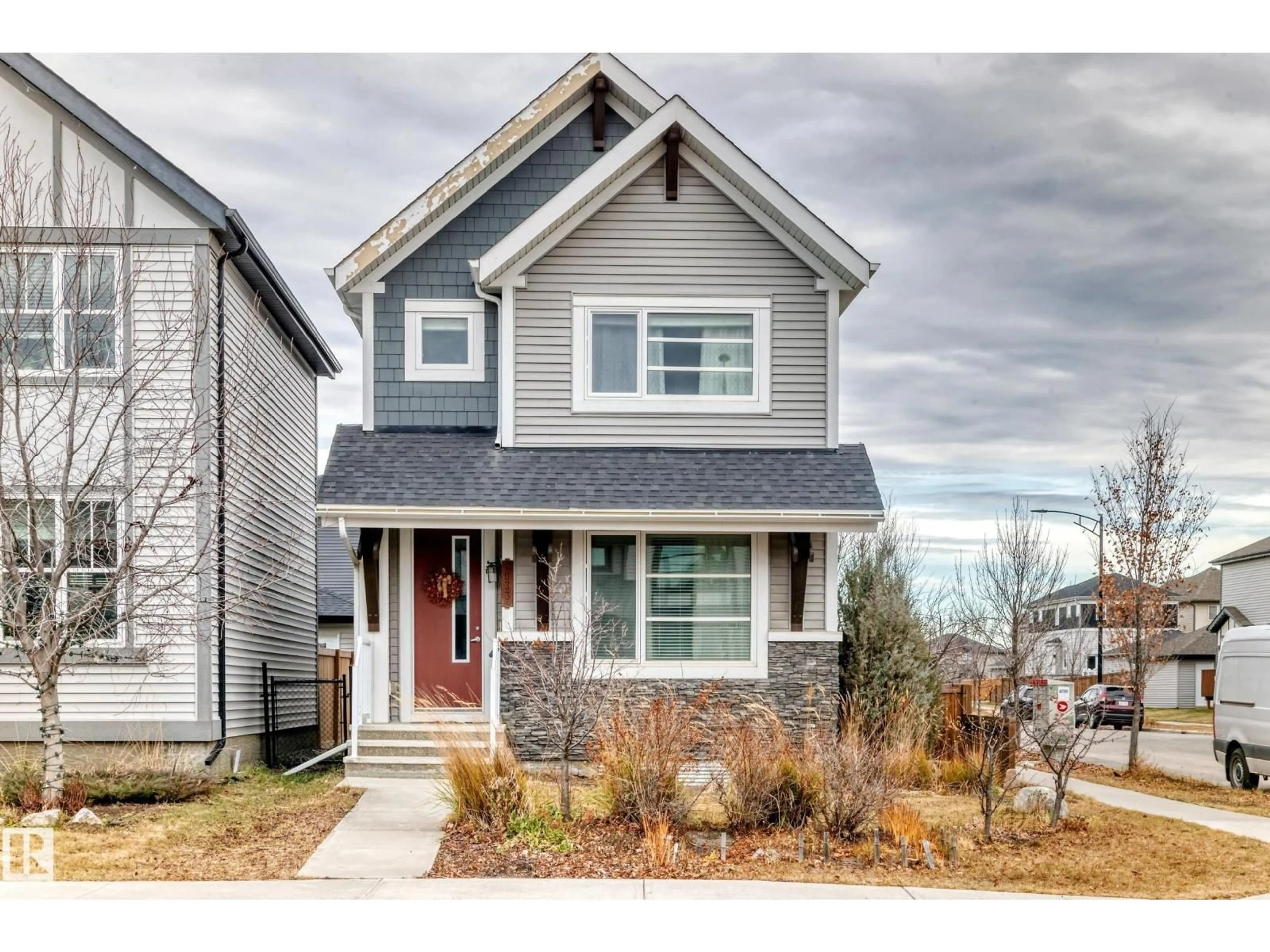 Home with vinyl exterior material, street for 2033 CAVANAGH DR, Edmonton Alberta T6W3M7