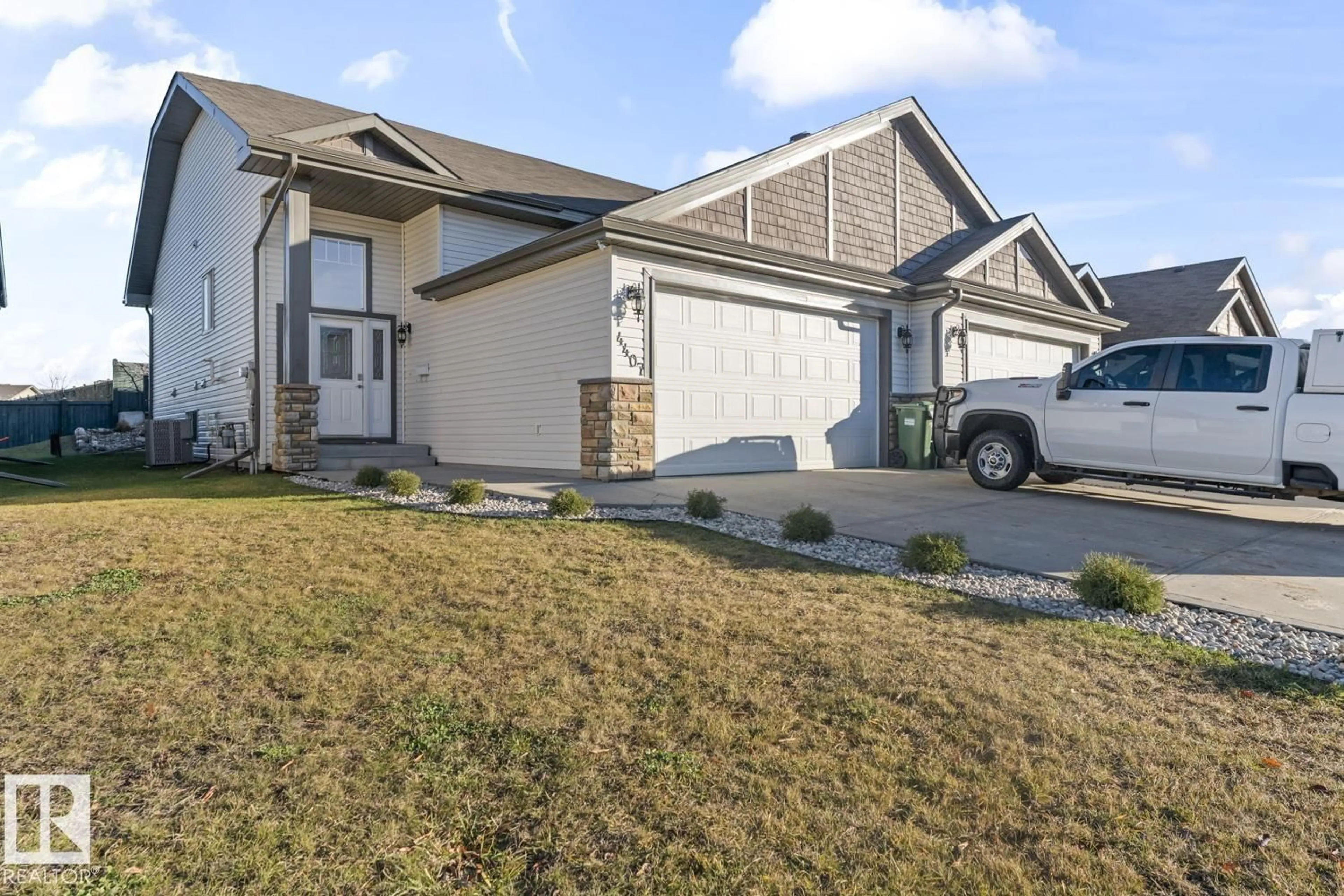Home with vinyl exterior material, street for 4407 38 ST, Bonnyville Town Alberta T9N0A8