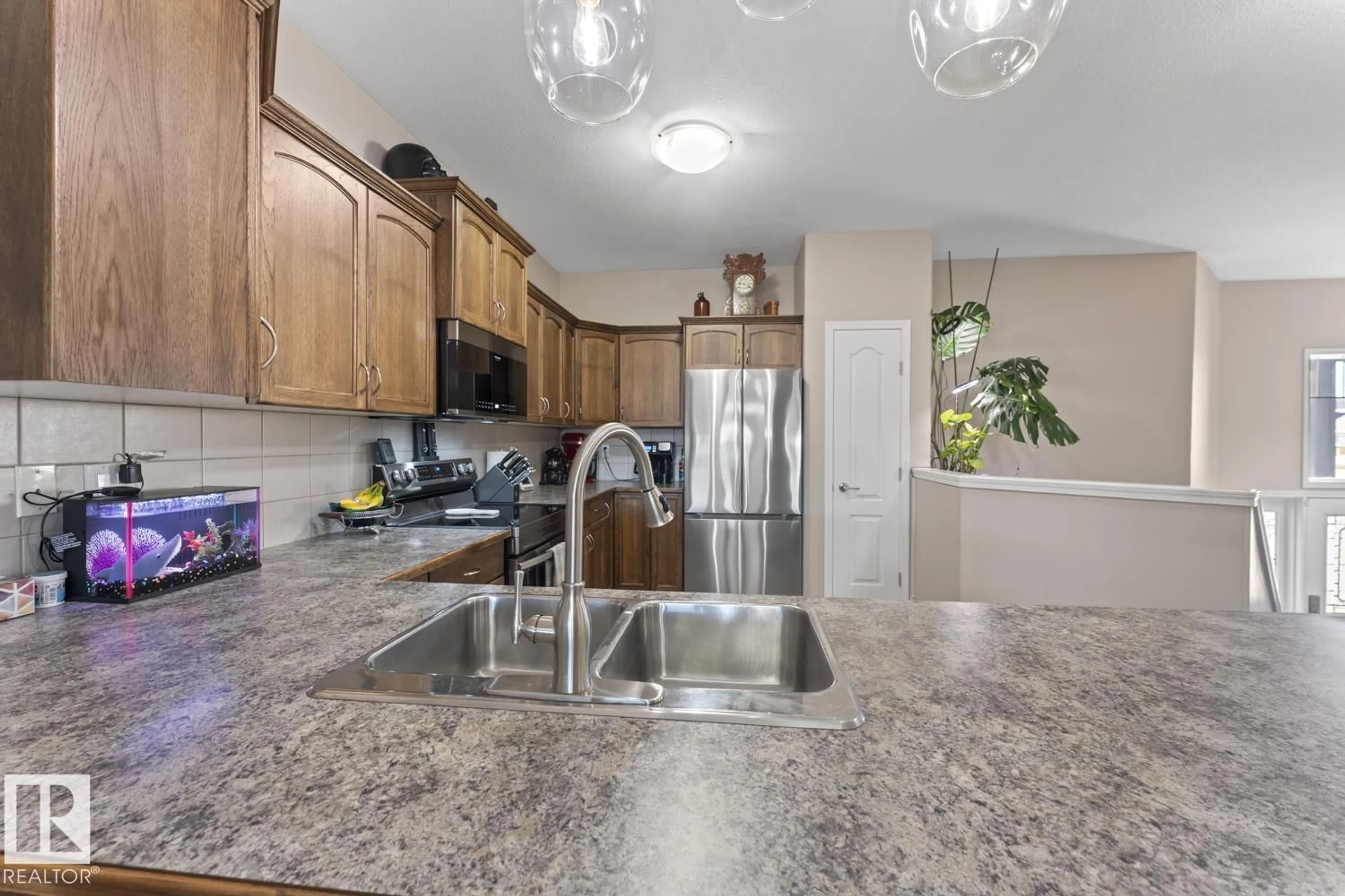 Open concept kitchen, ceramic/tile floor for 4407 38 ST, Bonnyville Town Alberta T9N0A8