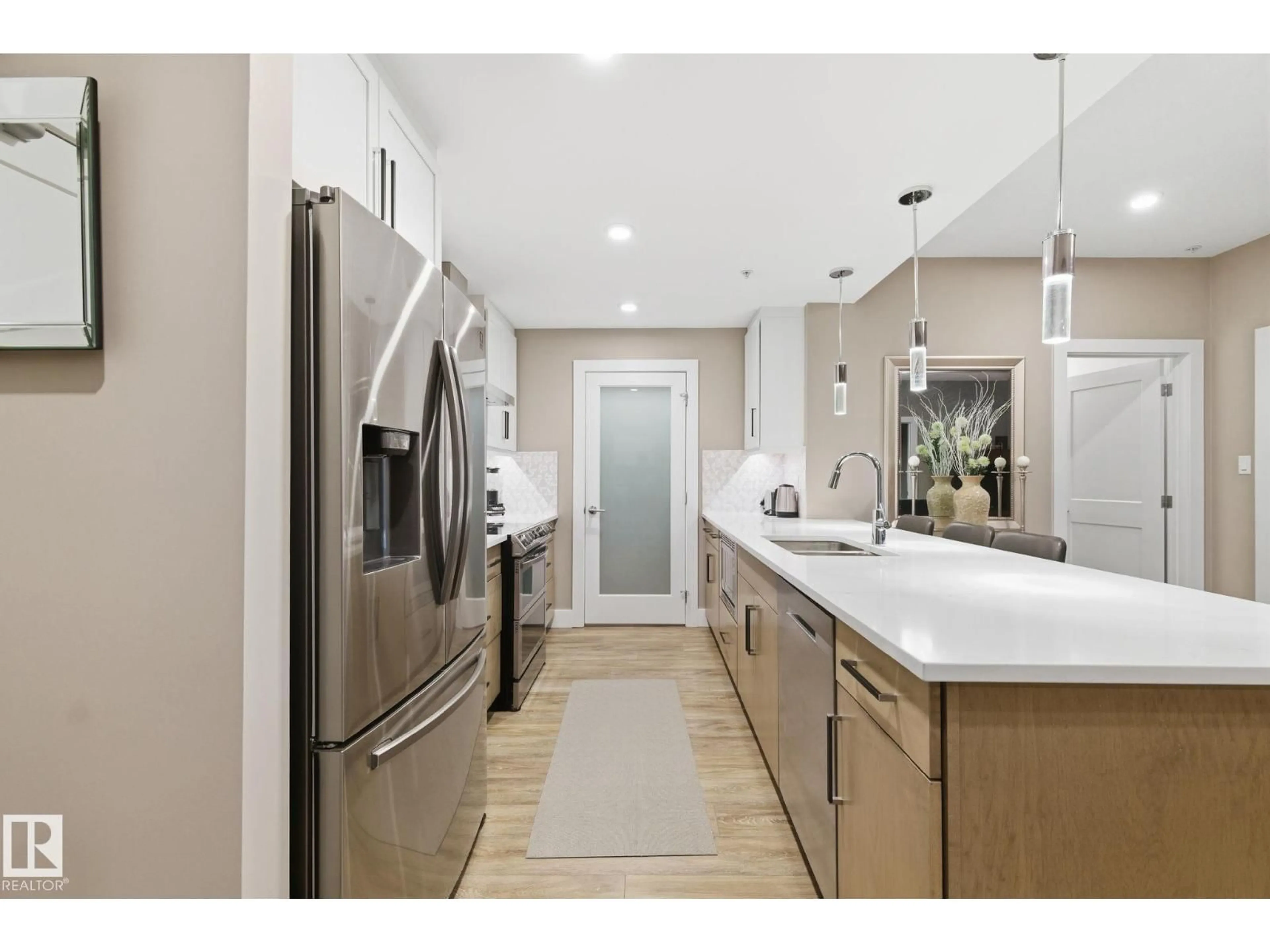 Open concept kitchen, unknown for #113 - 528 GRIESBACH PARADE PR, Edmonton Alberta T5E6X2