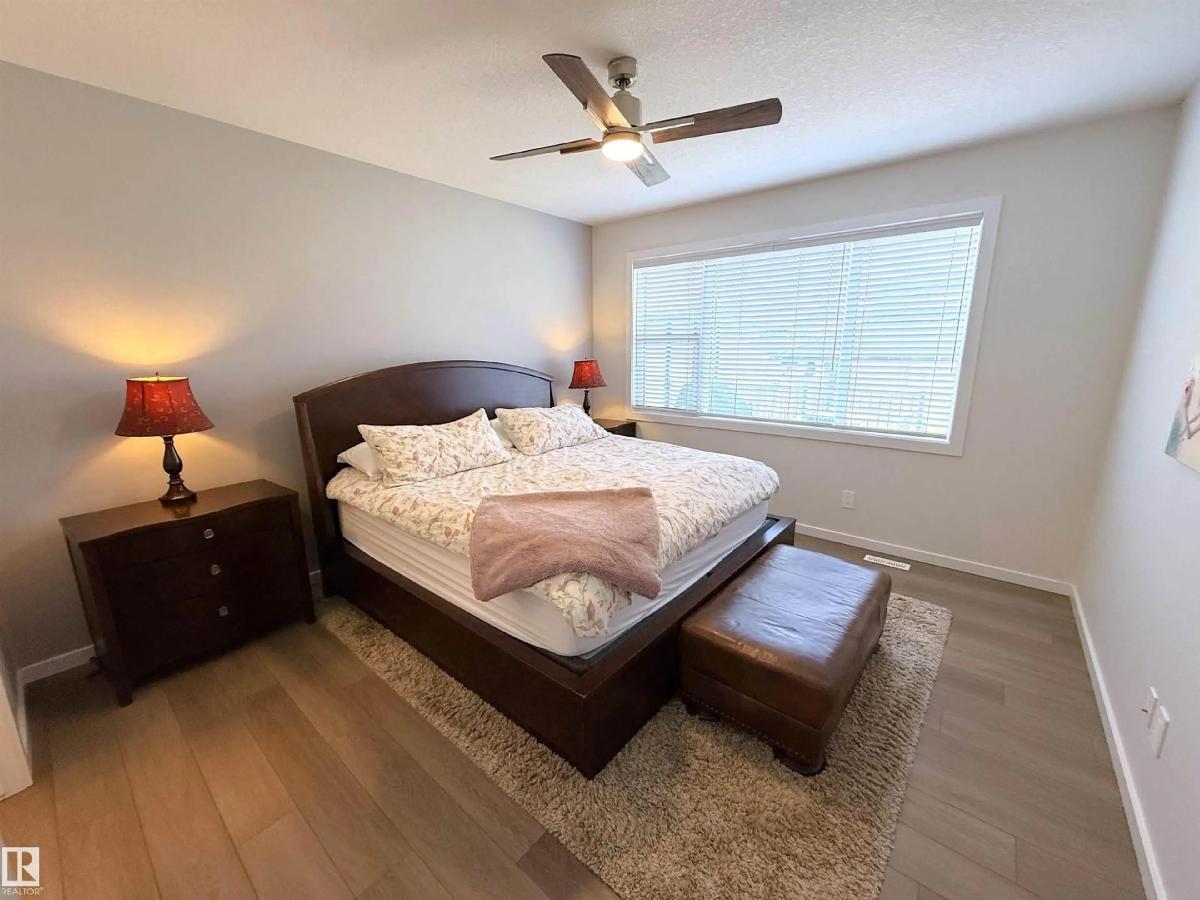 Bedroom with bed, wood/laminate floor for 22114 81A AV, Edmonton Alberta T5T7T4