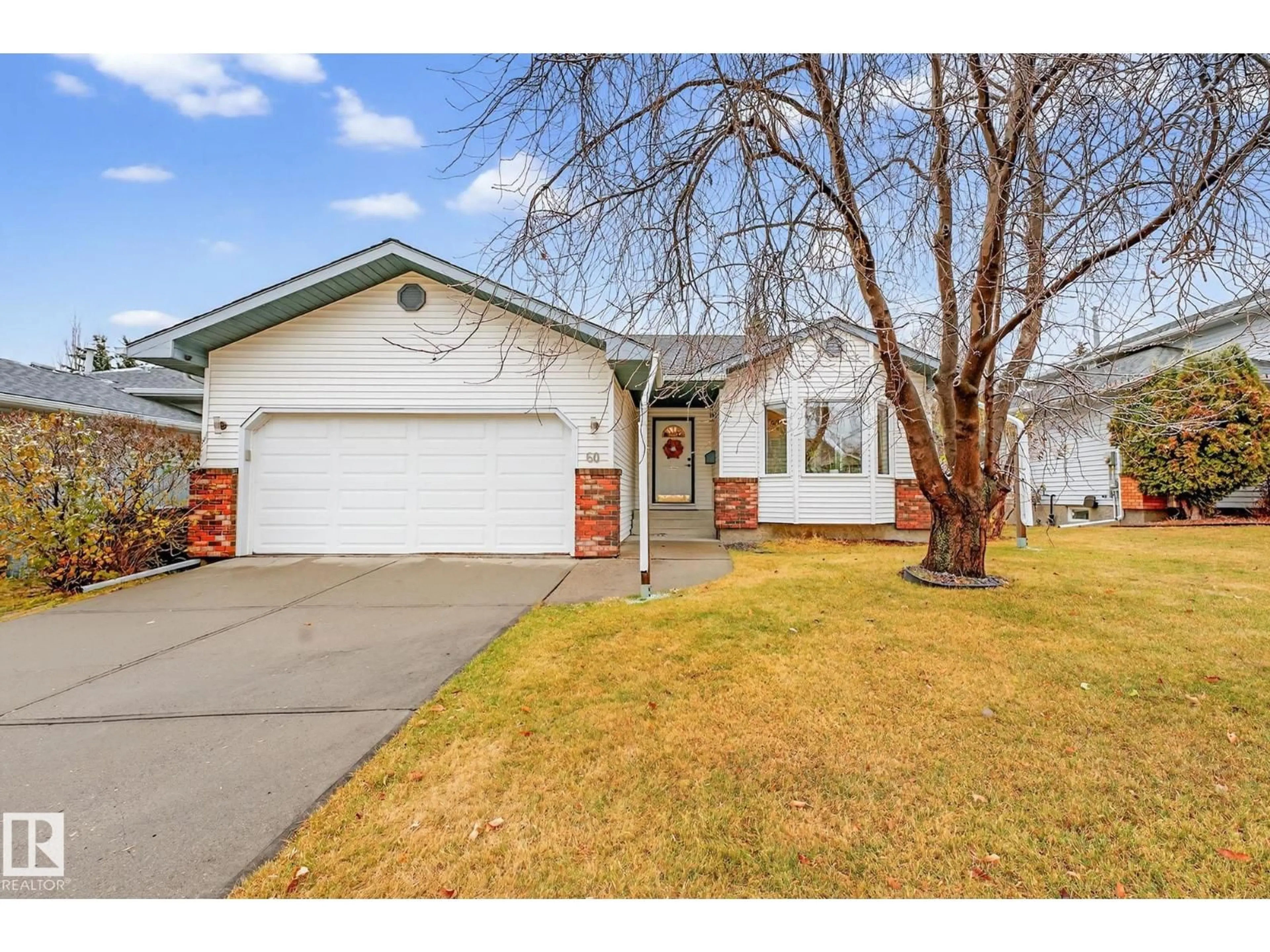 Home with vinyl exterior material, street for 60 HIGHLAND WY, Sherwood Park Alberta T8A5K1