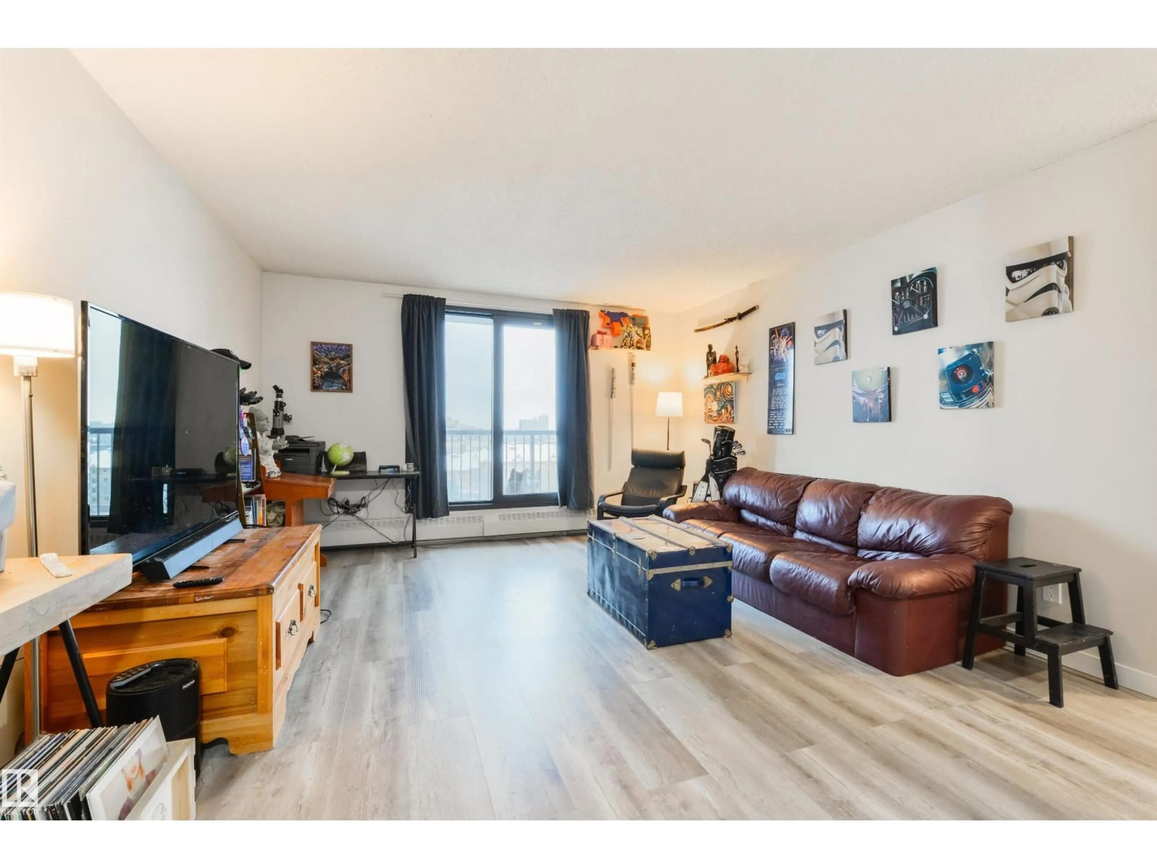 Living room with furniture, wood/laminate floor for #908 - 10145 109 ST, Edmonton Alberta T5J3M5
