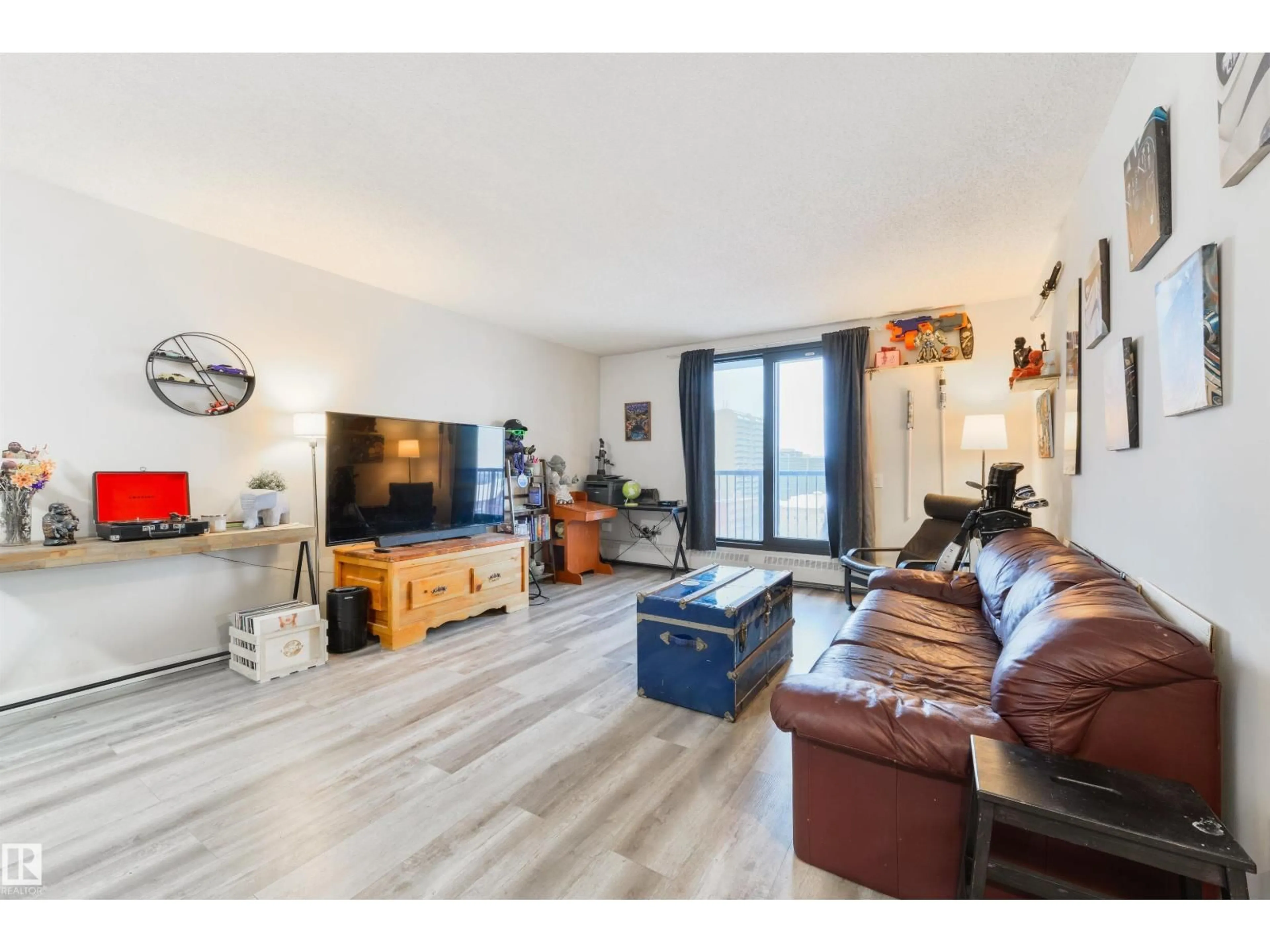 Living room with furniture, wood/laminate floor for #908 - 10145 109 ST, Edmonton Alberta T5J3M5