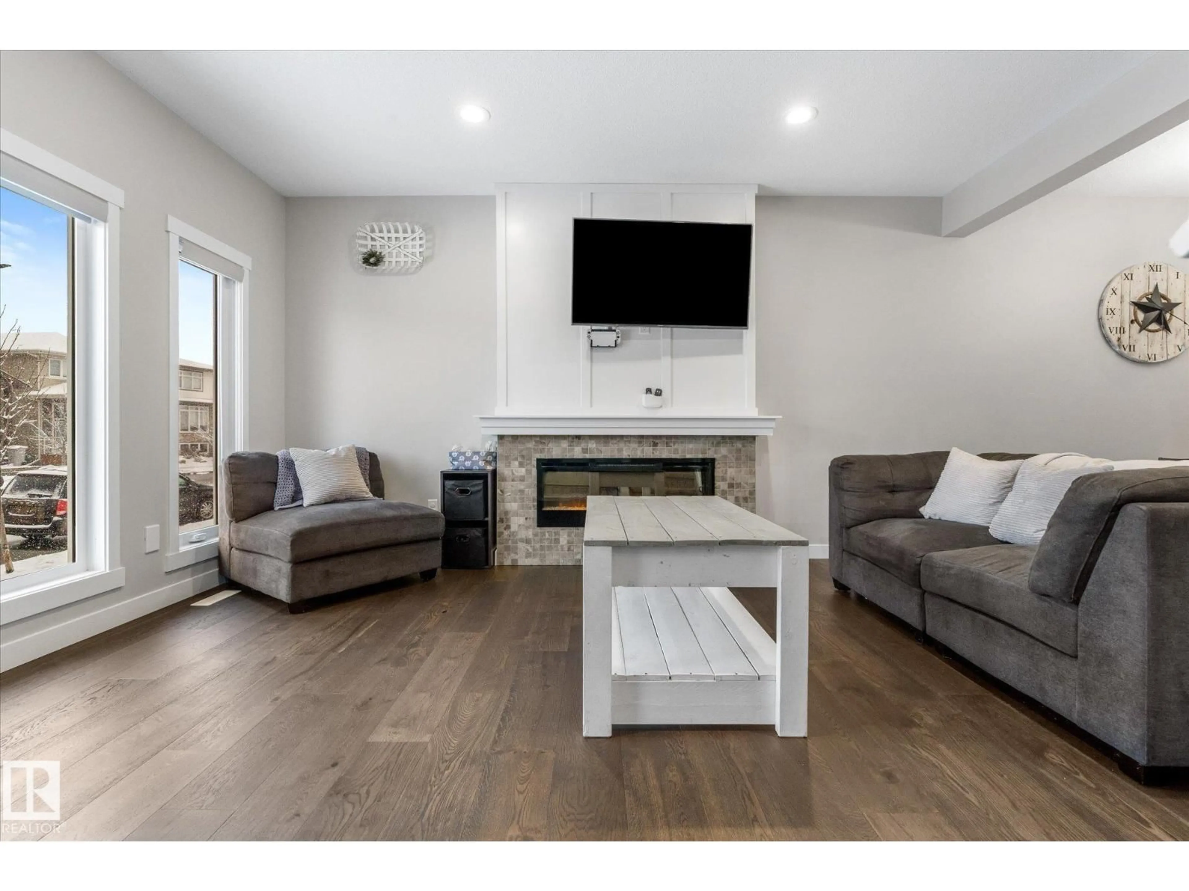 Living room with furniture, wood/laminate floor for 26 BRICKYARD DR, Stony Plain Alberta T7Z0H9