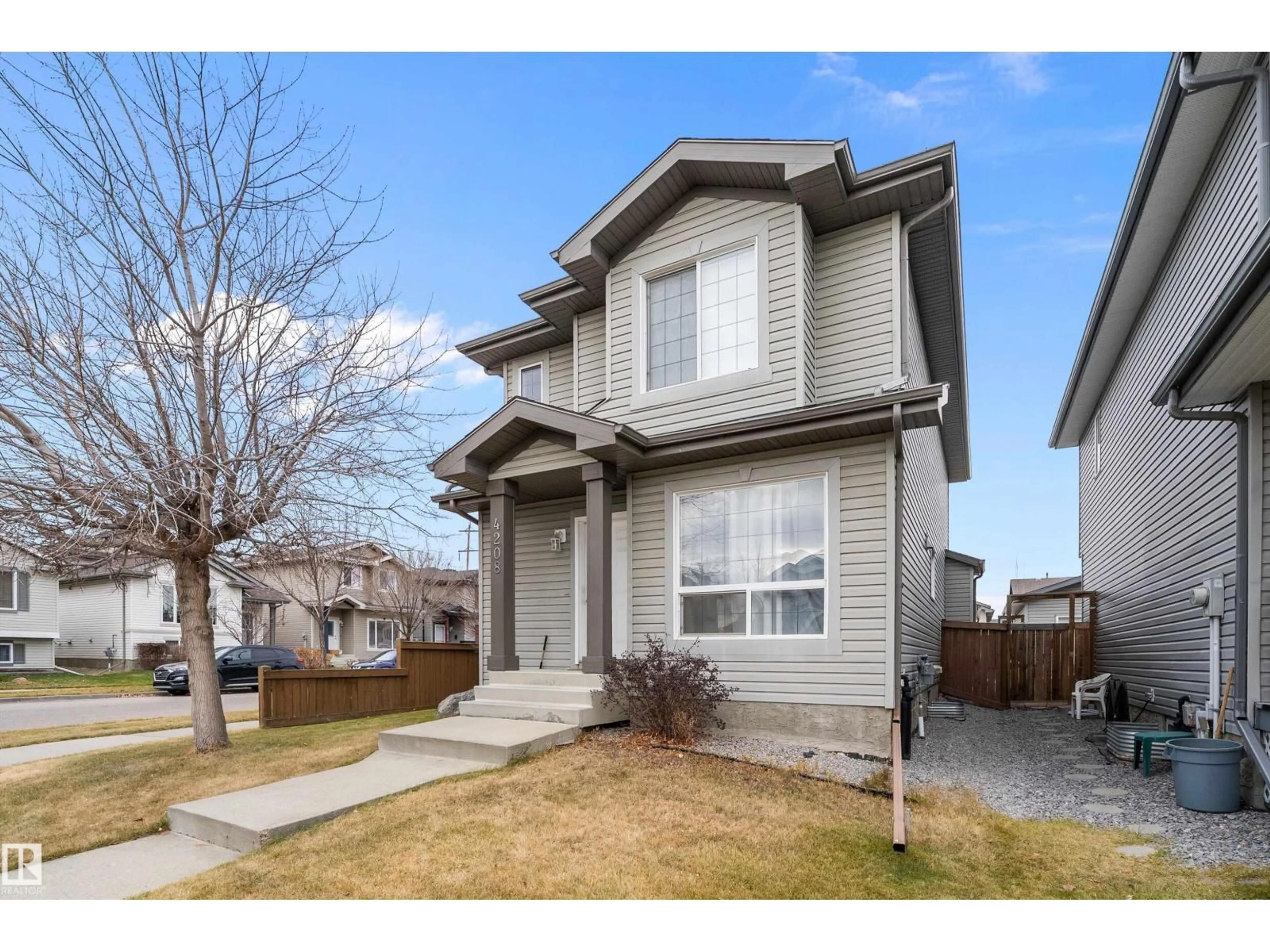 Home with vinyl exterior material, street for 4208 161 AV, Edmonton Alberta T5Y0G5