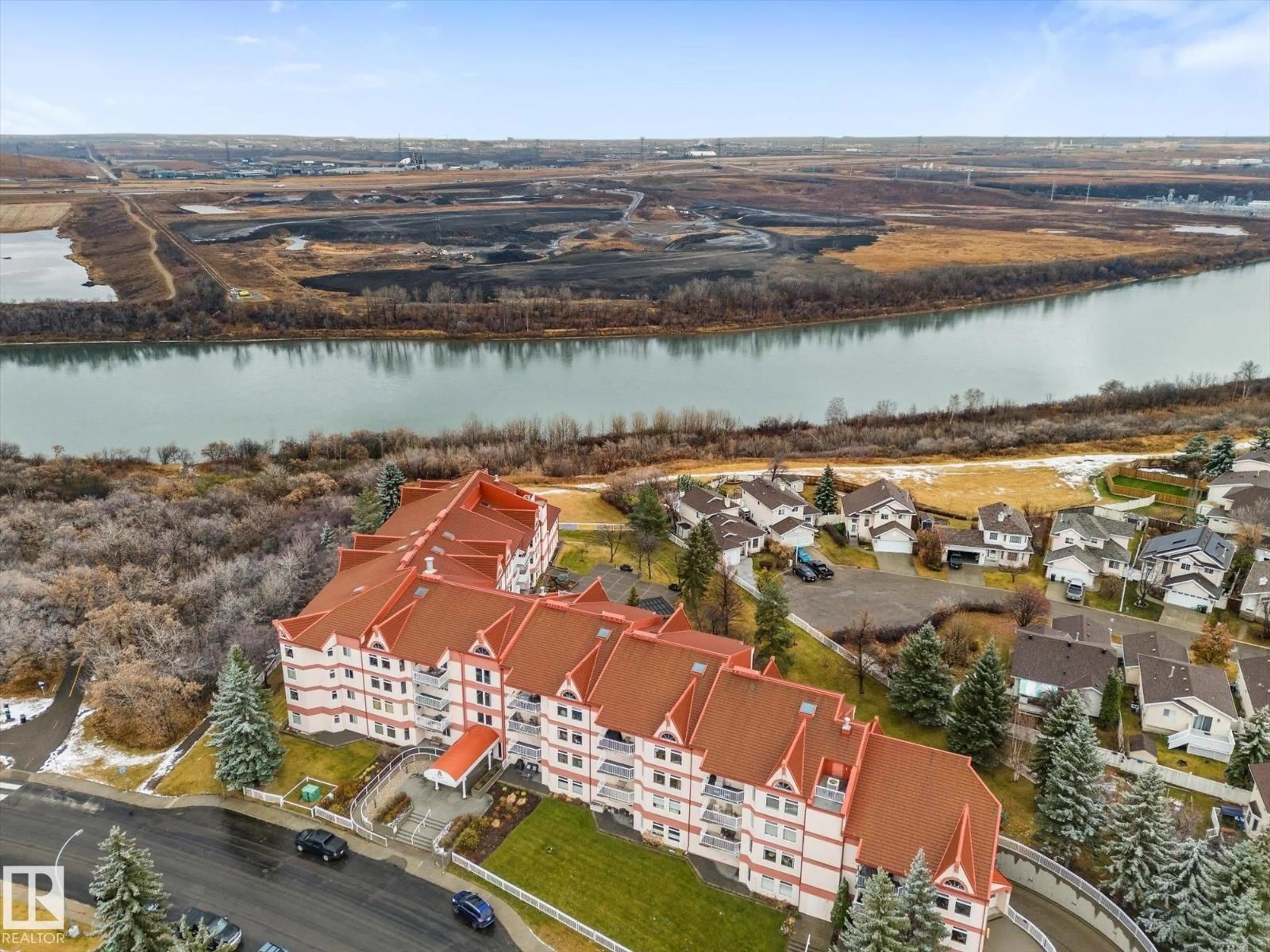 A pic from outside/outdoor area/front of a property/back of a property/a pic from drone, water/lake/river/ocean view for #114 - 2011 137 AV, Edmonton Alberta T5A4W2