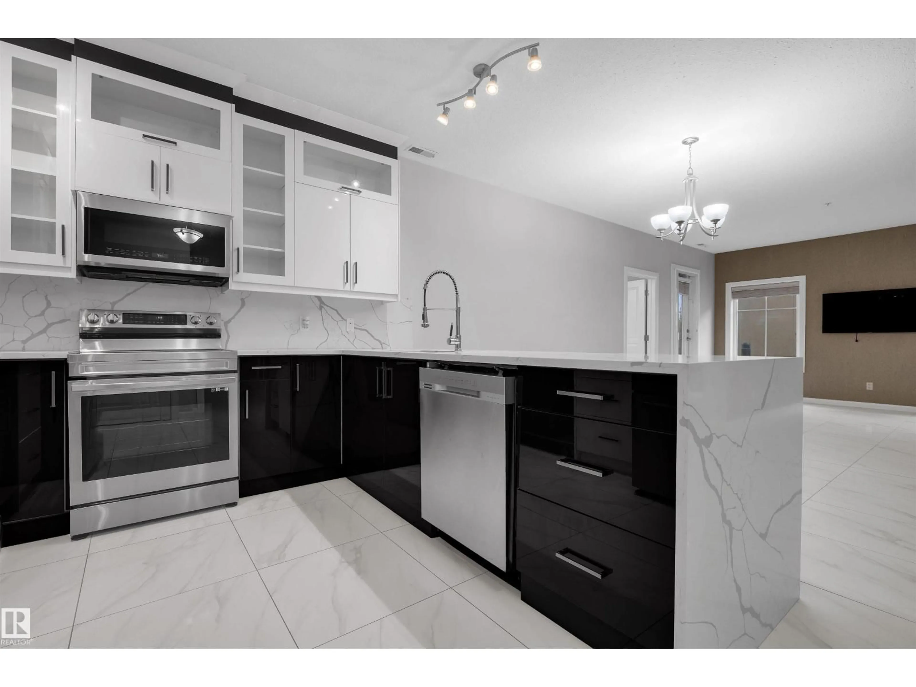 Open concept kitchen, ceramic/tile floor for 160 - 105 MAGRATH RD, Edmonton Alberta T6R3T7