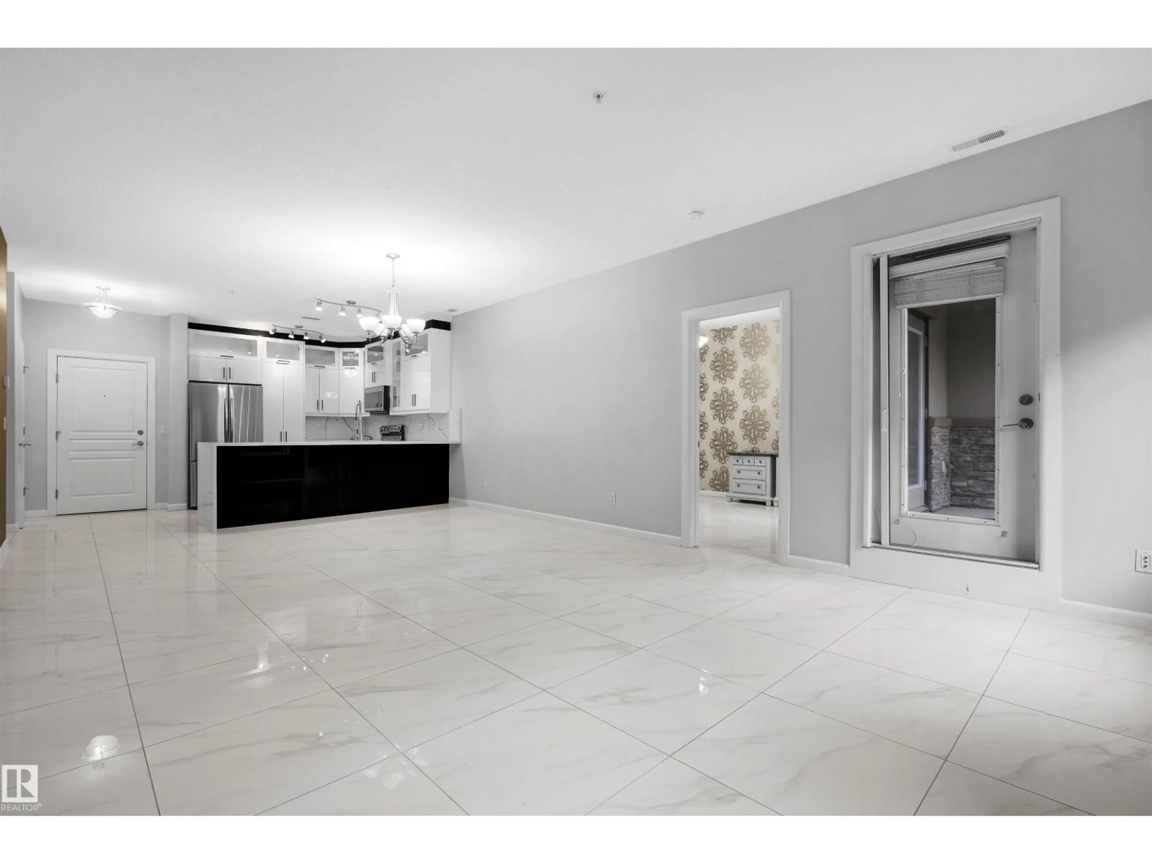 Indoor foyer for 160 - 105 MAGRATH RD, Edmonton Alberta T6R3T7