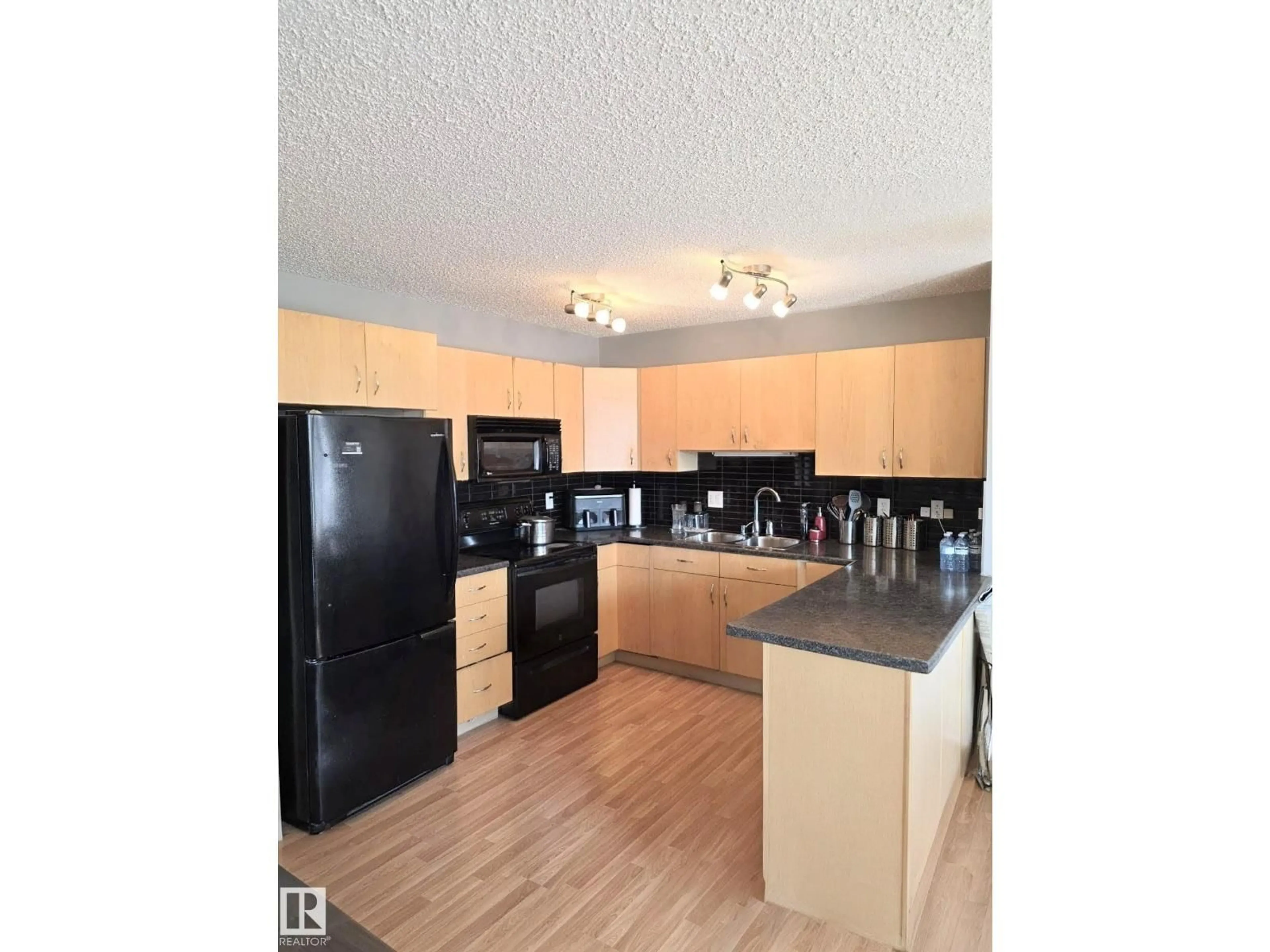 Standard kitchen, wood/laminate floor for 11 - 6304 SANDIN WY, Edmonton Alberta T6R0J8