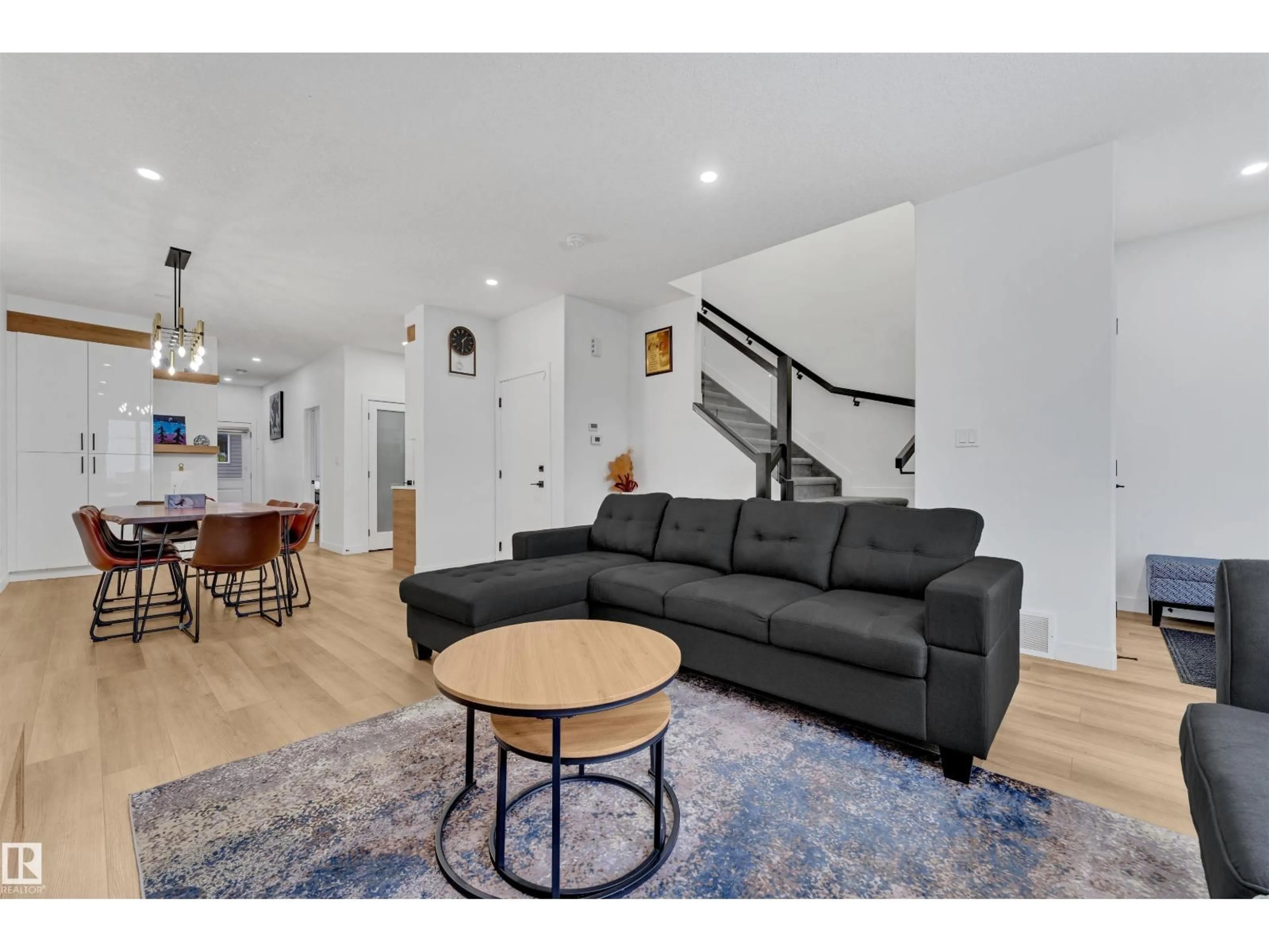 Living room with furniture, unknown for 217 CHARLESWORTH DR, Edmonton Alberta T6X2W2