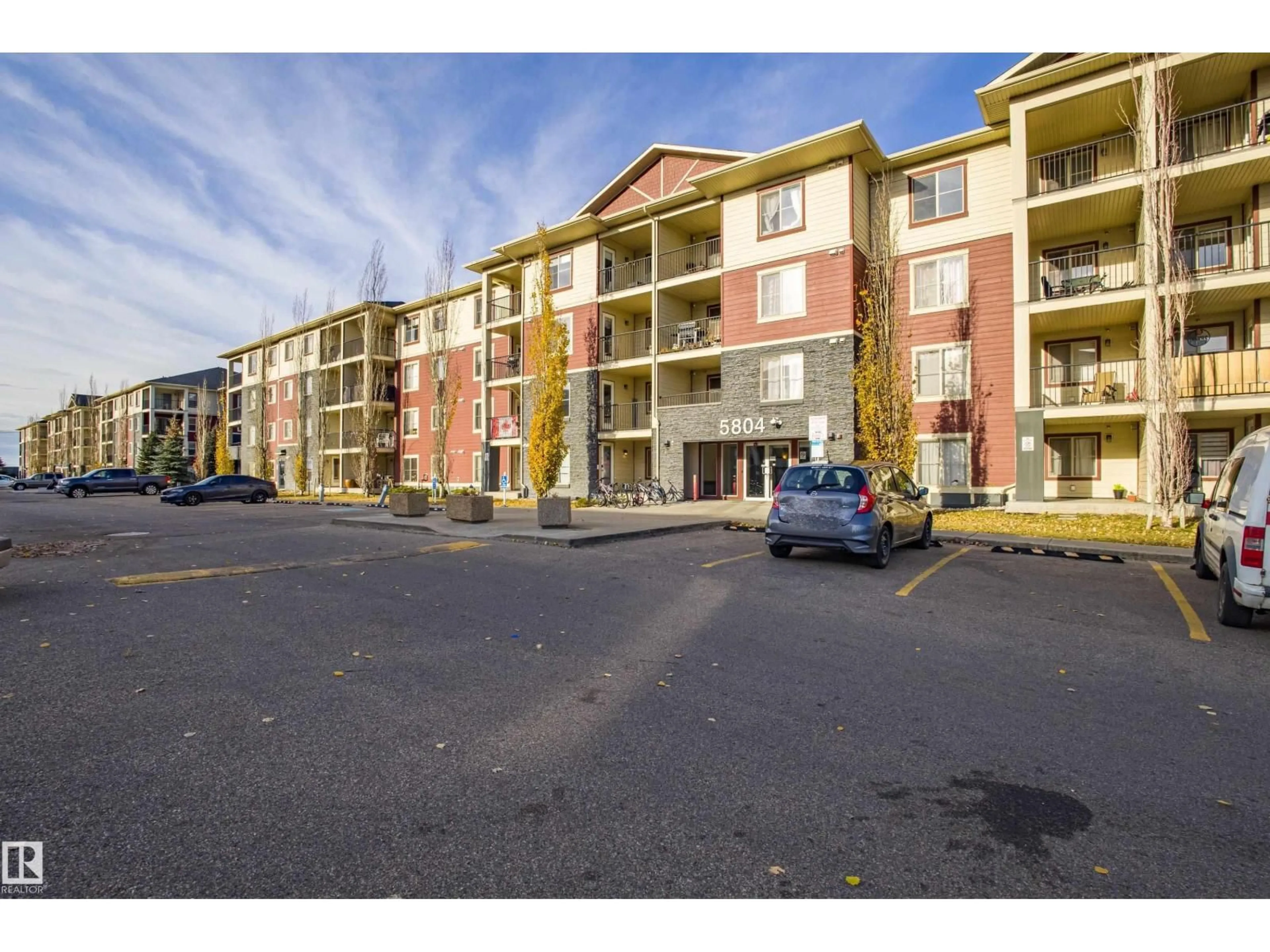 A pic from outside/outdoor area/front of a property/back of a property/a pic from drone, street for 201 - 5804 MULLEN PL, Edmonton Alberta T6R0W3