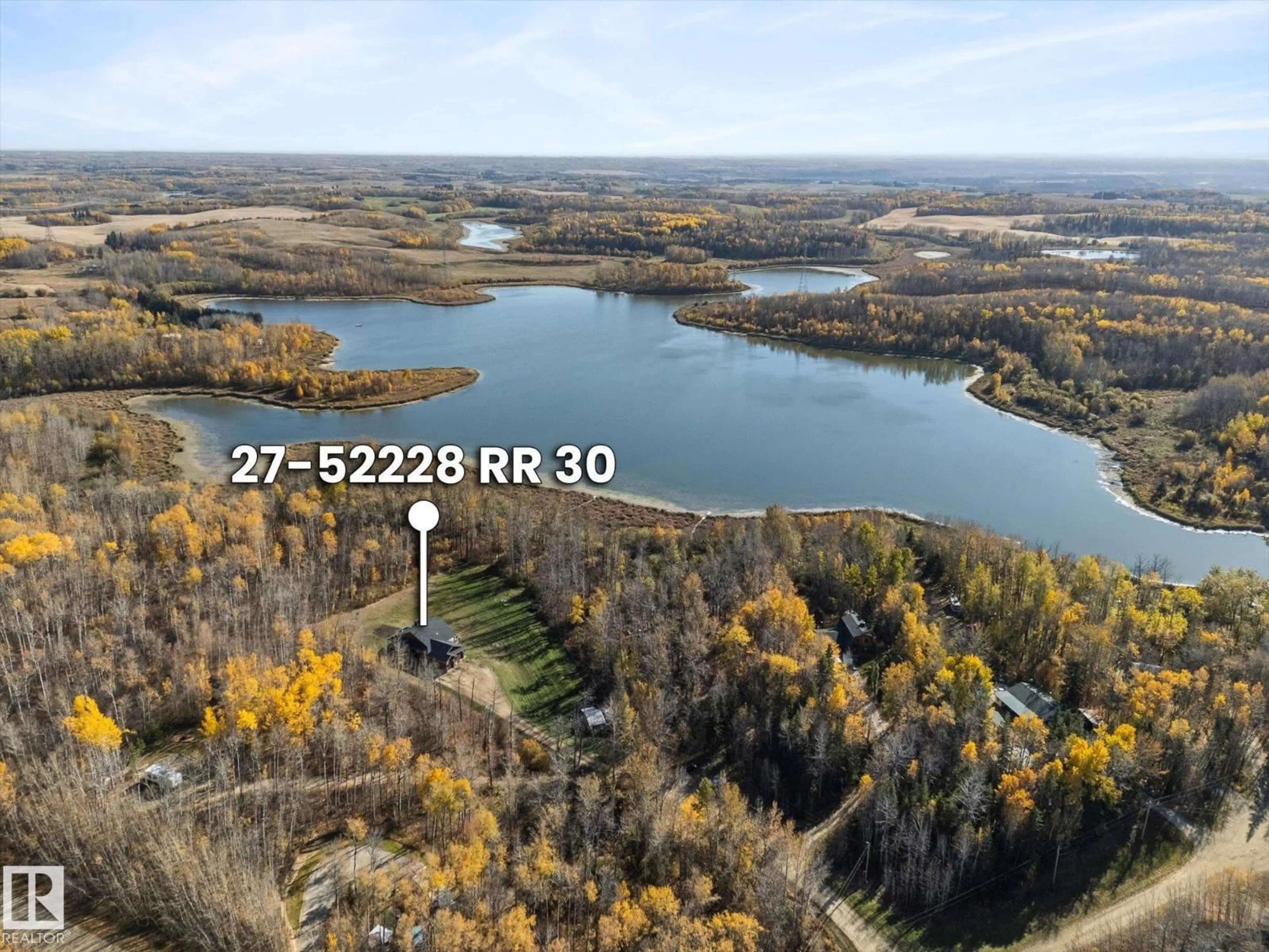 A pic from outside/outdoor area/front of a property/back of a property/a pic from drone, water/lake/river/ocean view for 27 52228 RGE ROAD 30, Rural Parkland County Alberta T7Y2M5