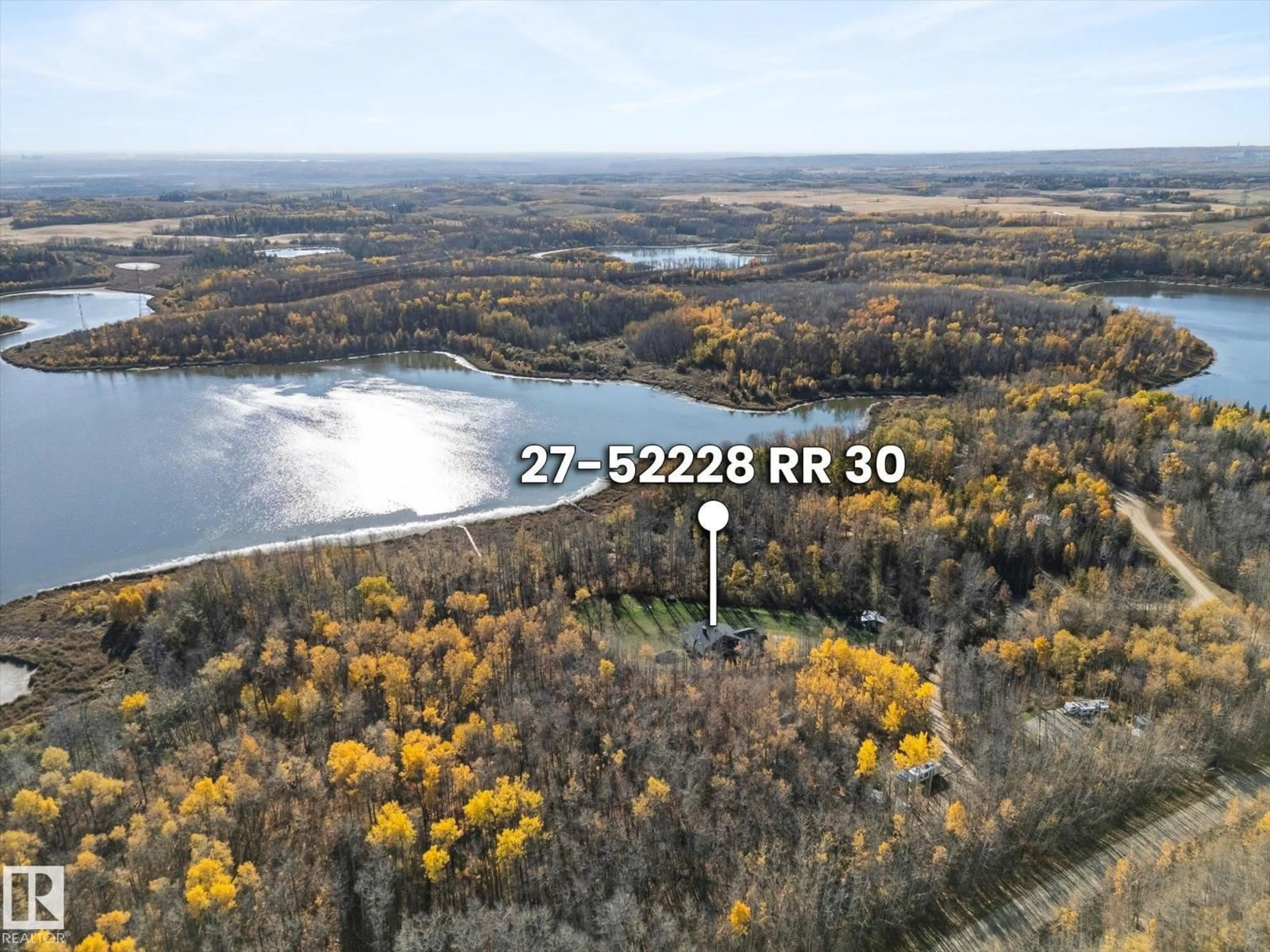 A pic from outside/outdoor area/front of a property/back of a property/a pic from drone, water/lake/river/ocean view for 27 52228 RGE ROAD 30, Rural Parkland County Alberta T7Y2M5