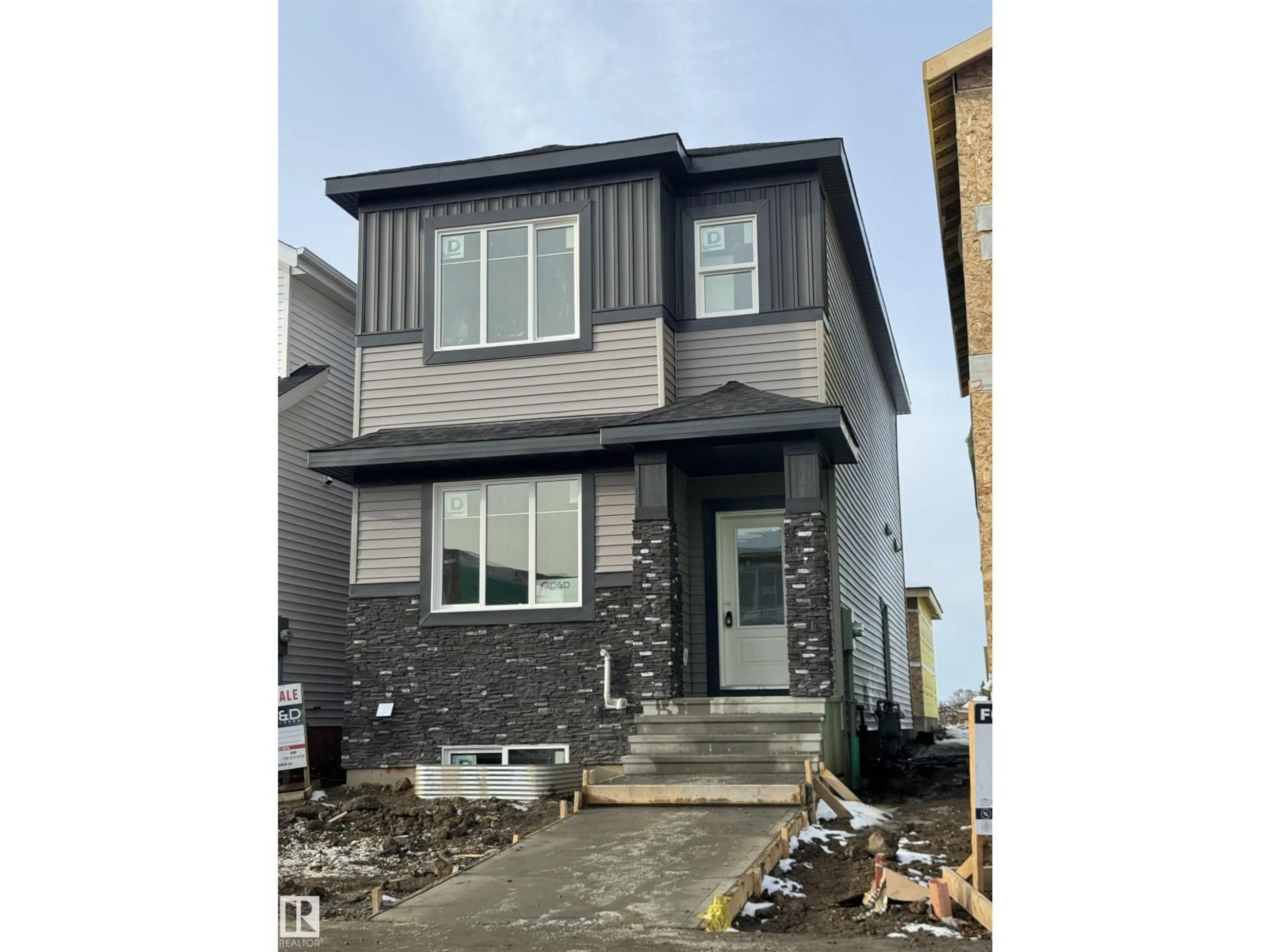 Home with vinyl exterior material, street for 438 CRYSTAL CREEK LI, Leduc Alberta T9E0X5