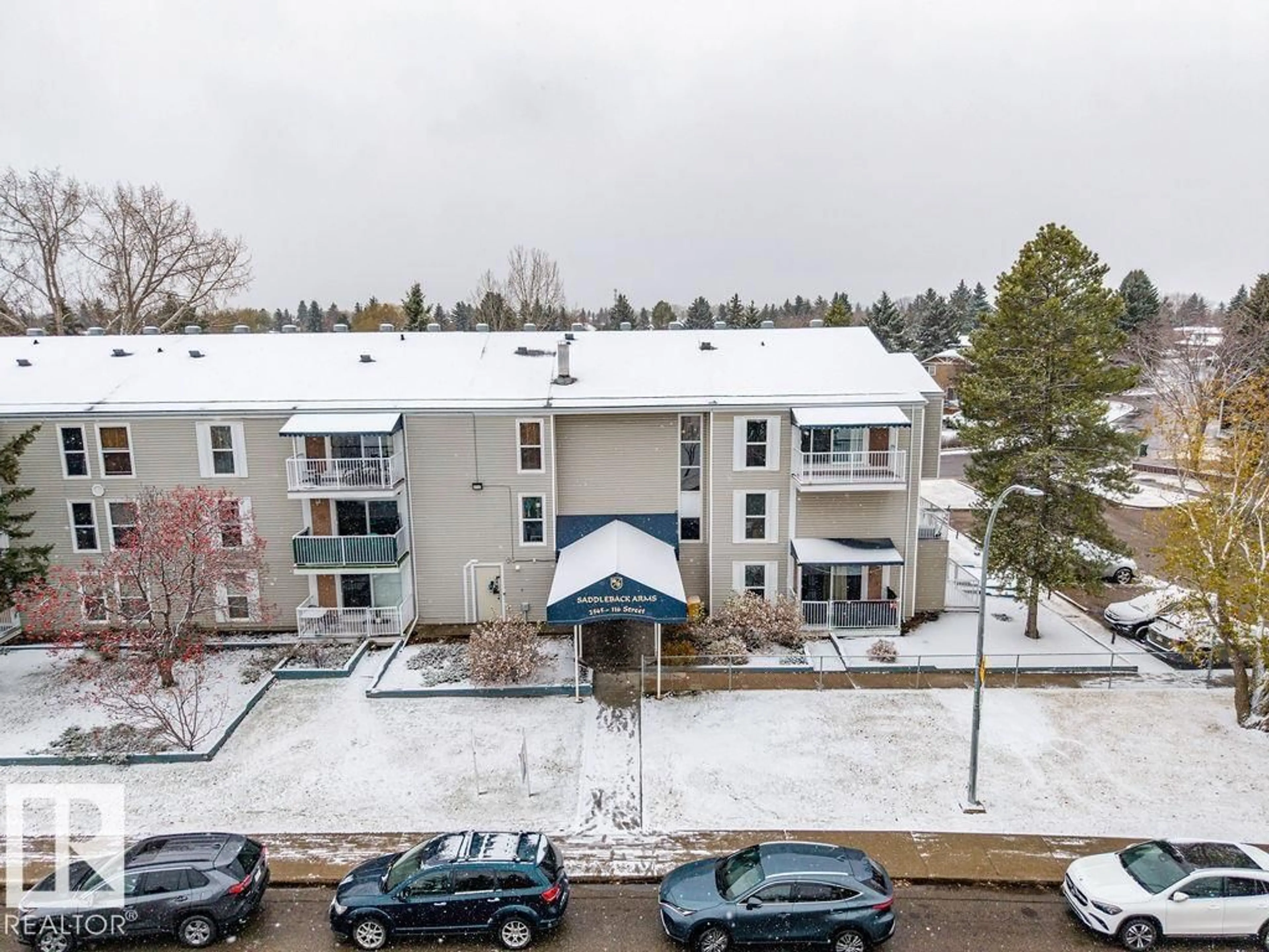 A pic from outside/outdoor area/front of a property/back of a property/a pic from drone, mountain view for #106 - 2545 116 ST, Edmonton Alberta T6J3Z7