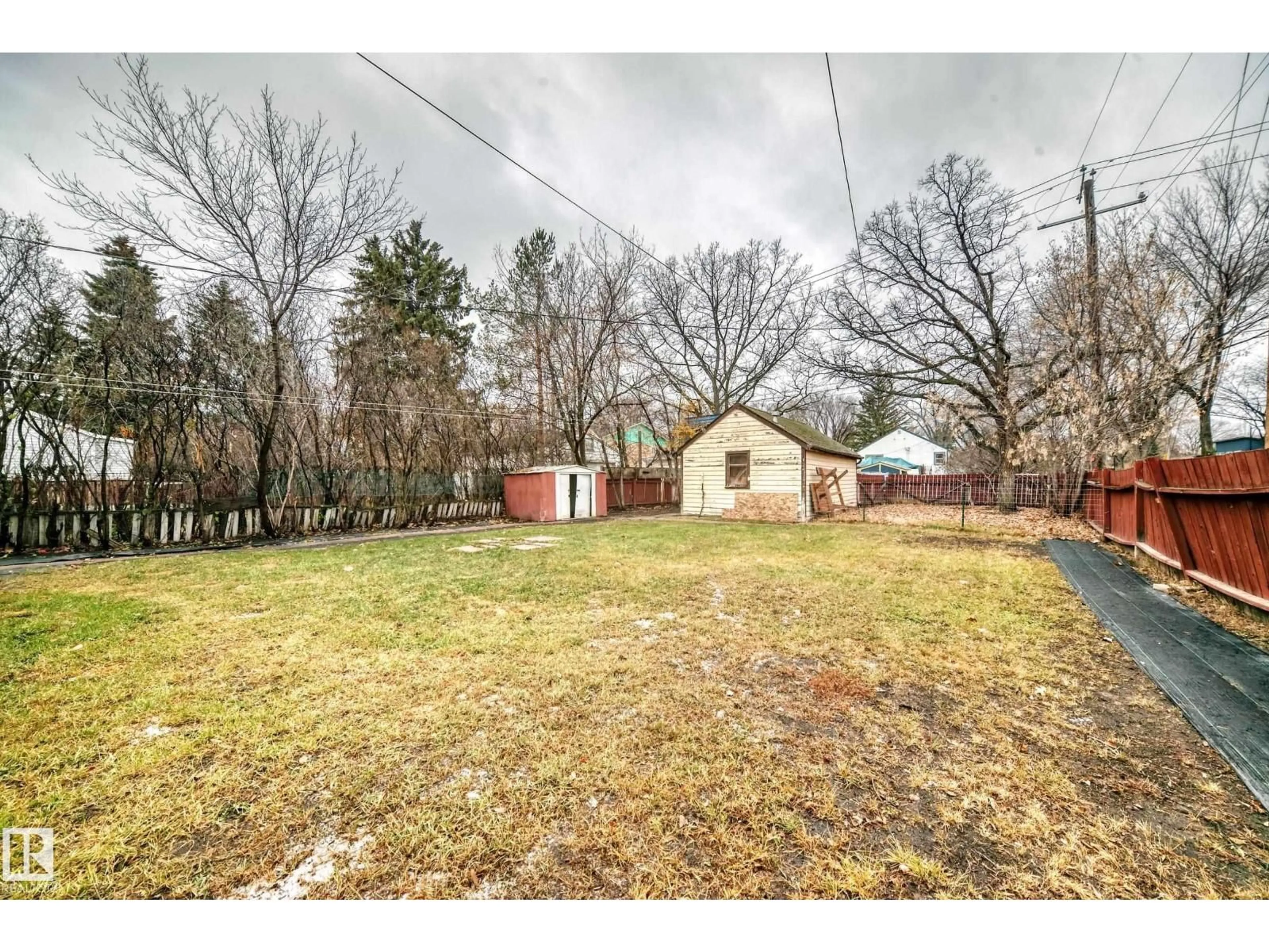 A pic from outside/outdoor area/front of a property/back of a property/a pic from drone, street for 10994 129 ST, Edmonton Alberta T5M0Y1