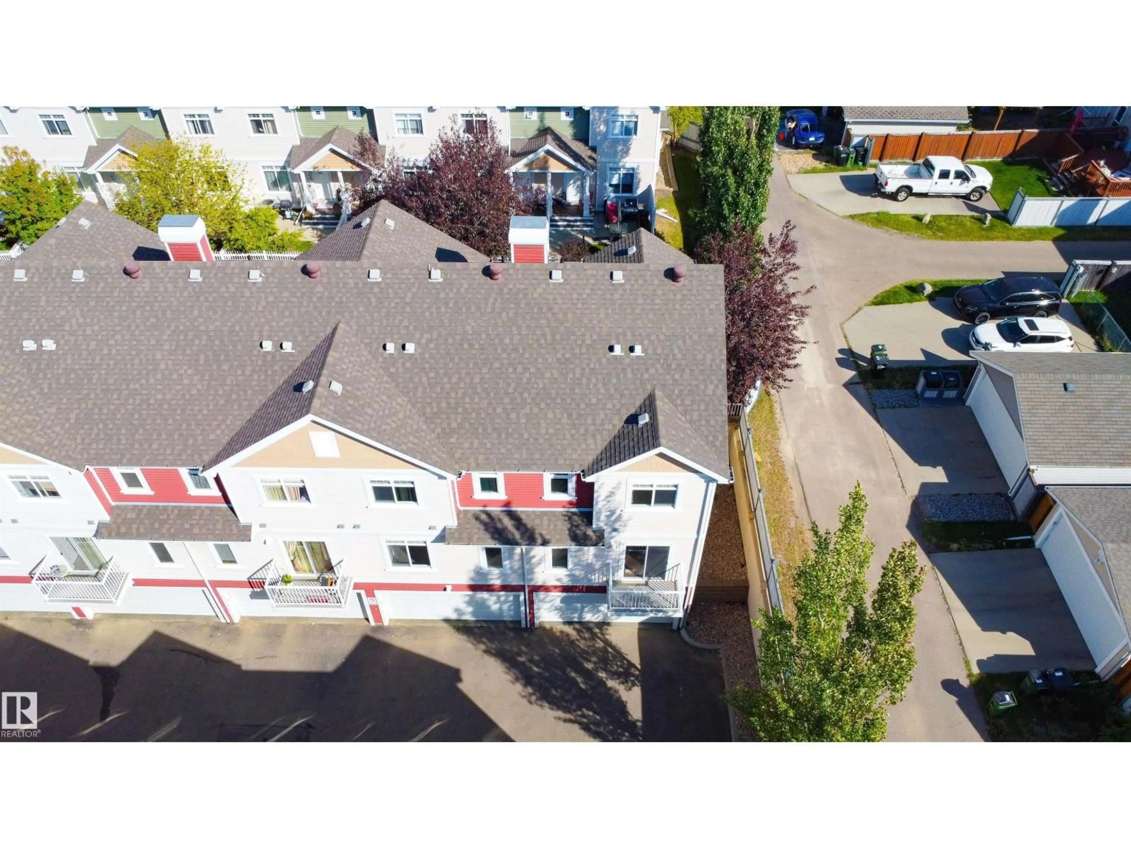 A pic from outside/outdoor area/front of a property/back of a property/a pic from drone, street for 154 - 1804 70 ST, Edmonton Alberta T6X0H4