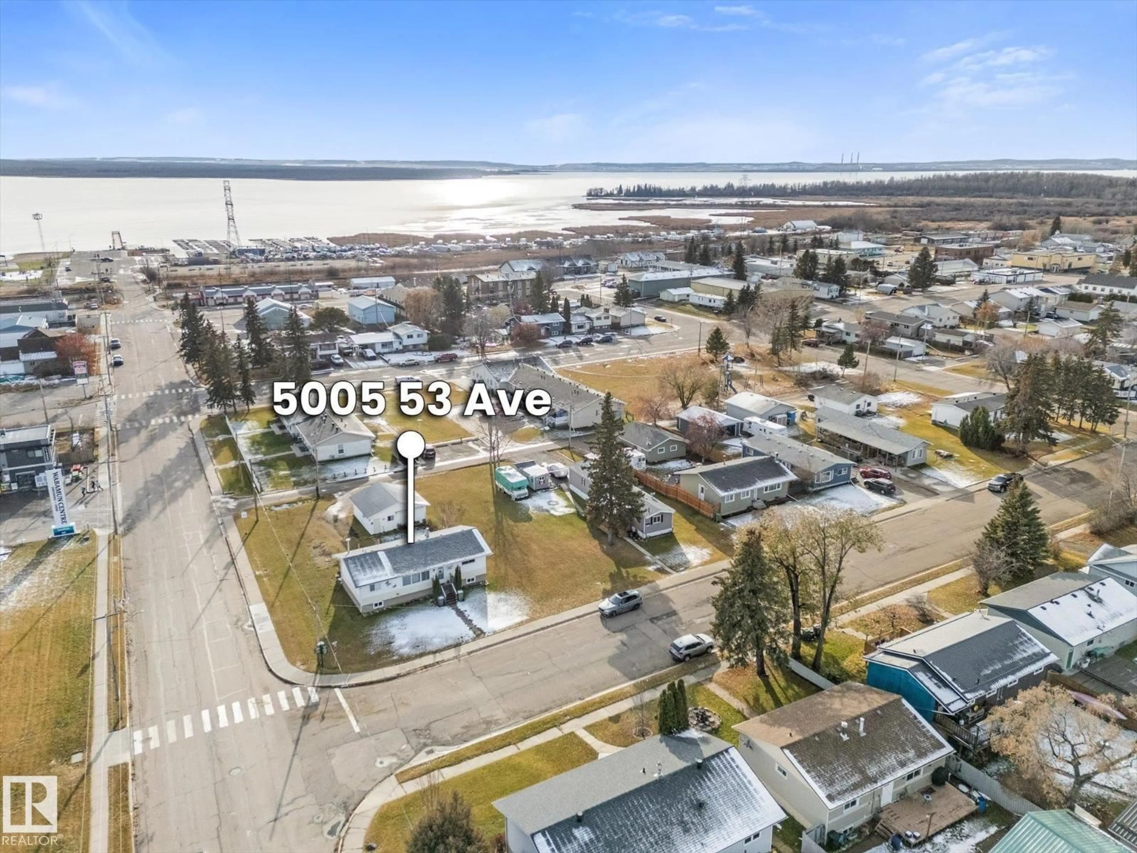A pic from outside/outdoor area/front of a property/back of a property/a pic from drone, water/lake/river/ocean view for 5005 53 AV, Wabamun Alberta T0E2K0