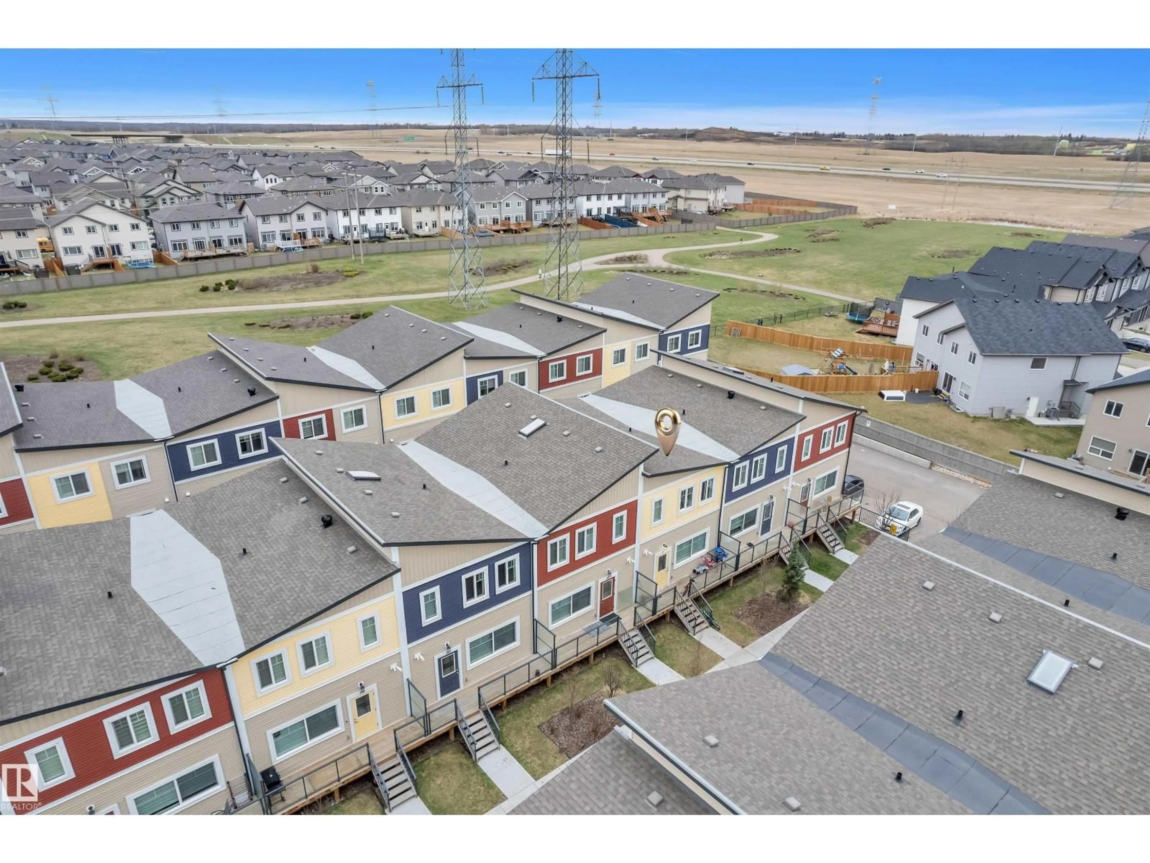 A pic from outside/outdoor area/front of a property/back of a property/a pic from drone, unknown for 21 - 2803 14 AV, Edmonton Alberta T6T2K4