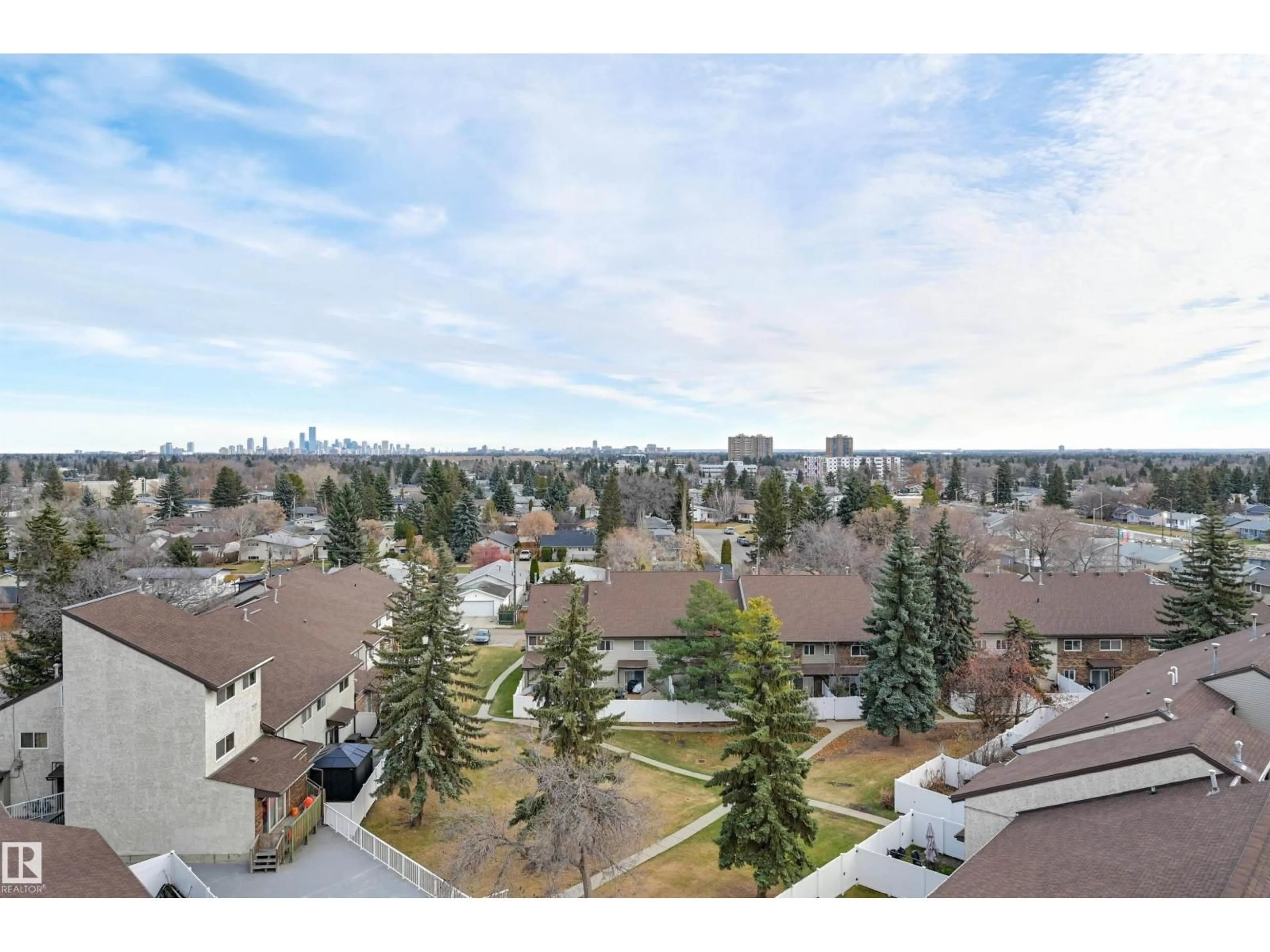 A pic from outside/outdoor area/front of a property/back of a property/a pic from drone, mountain view for #84 - 8735 165 ST NW, Edmonton Alberta T5R2R6