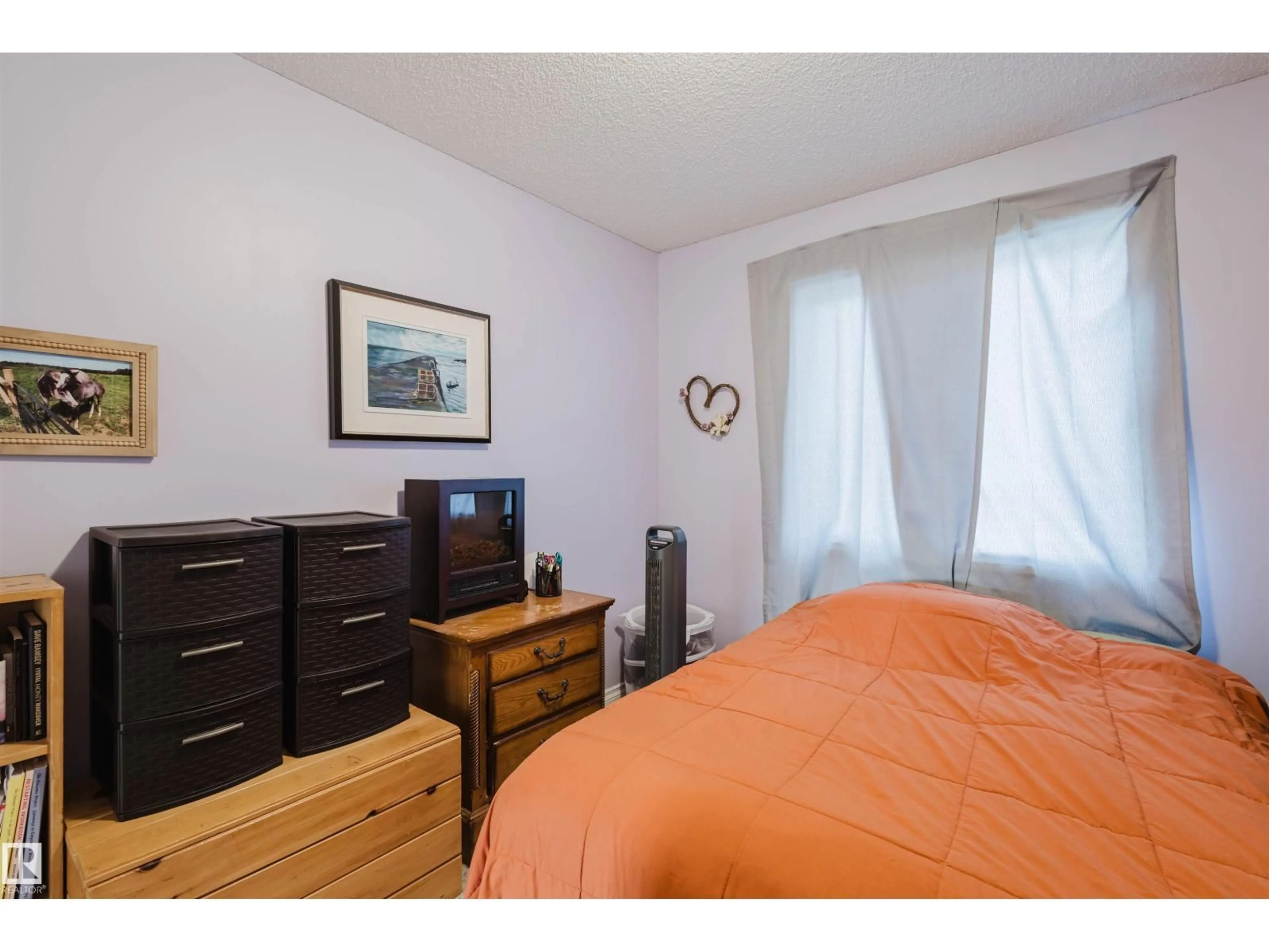 Bedroom with bed, wood/laminate floor for 1517 RUTHERFORD RD, Edmonton Alberta T6W1V9