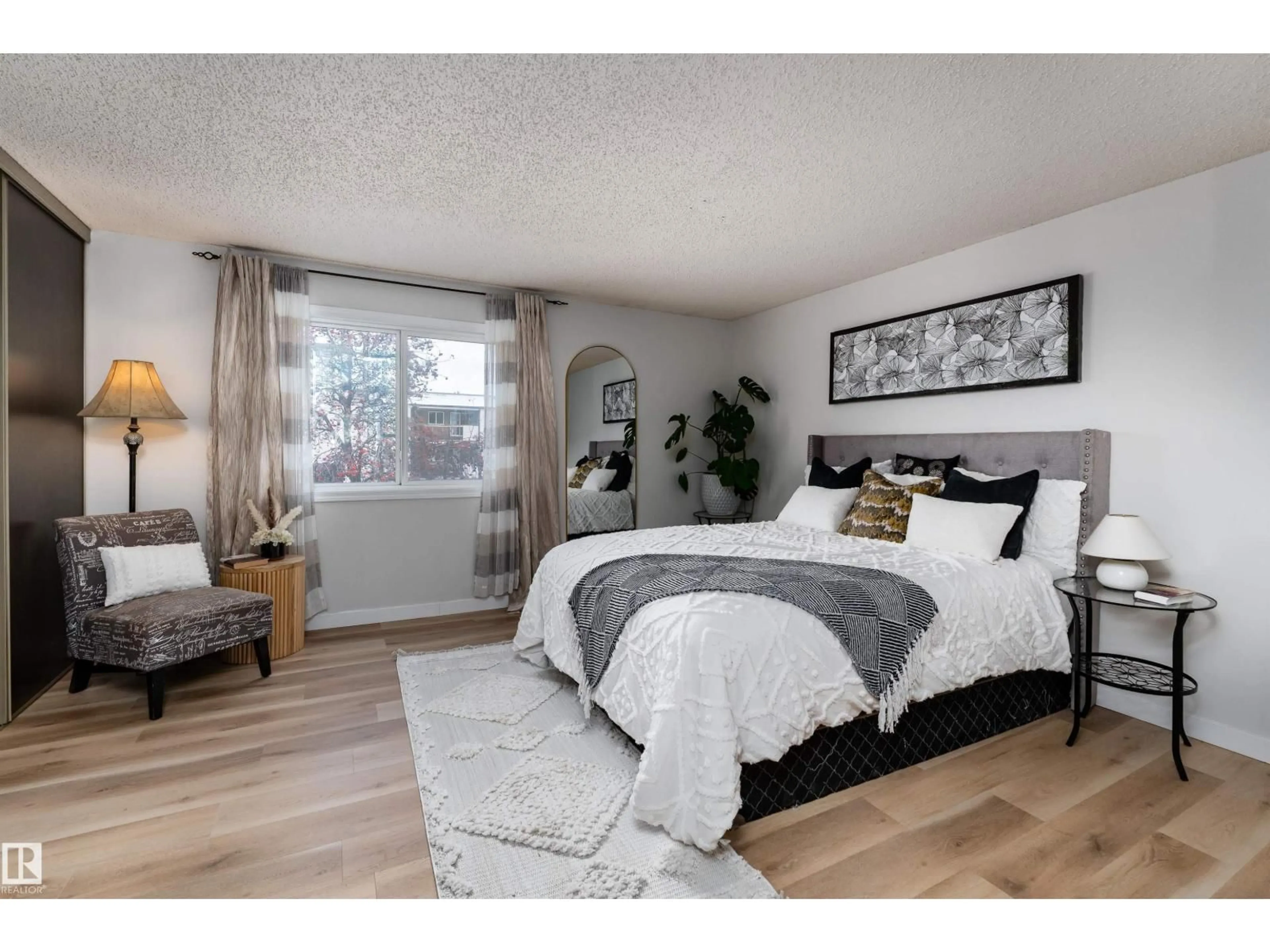 Bedroom with bed, wood/laminate floor for 2909 139 AV, Edmonton Alberta T5Y2B3