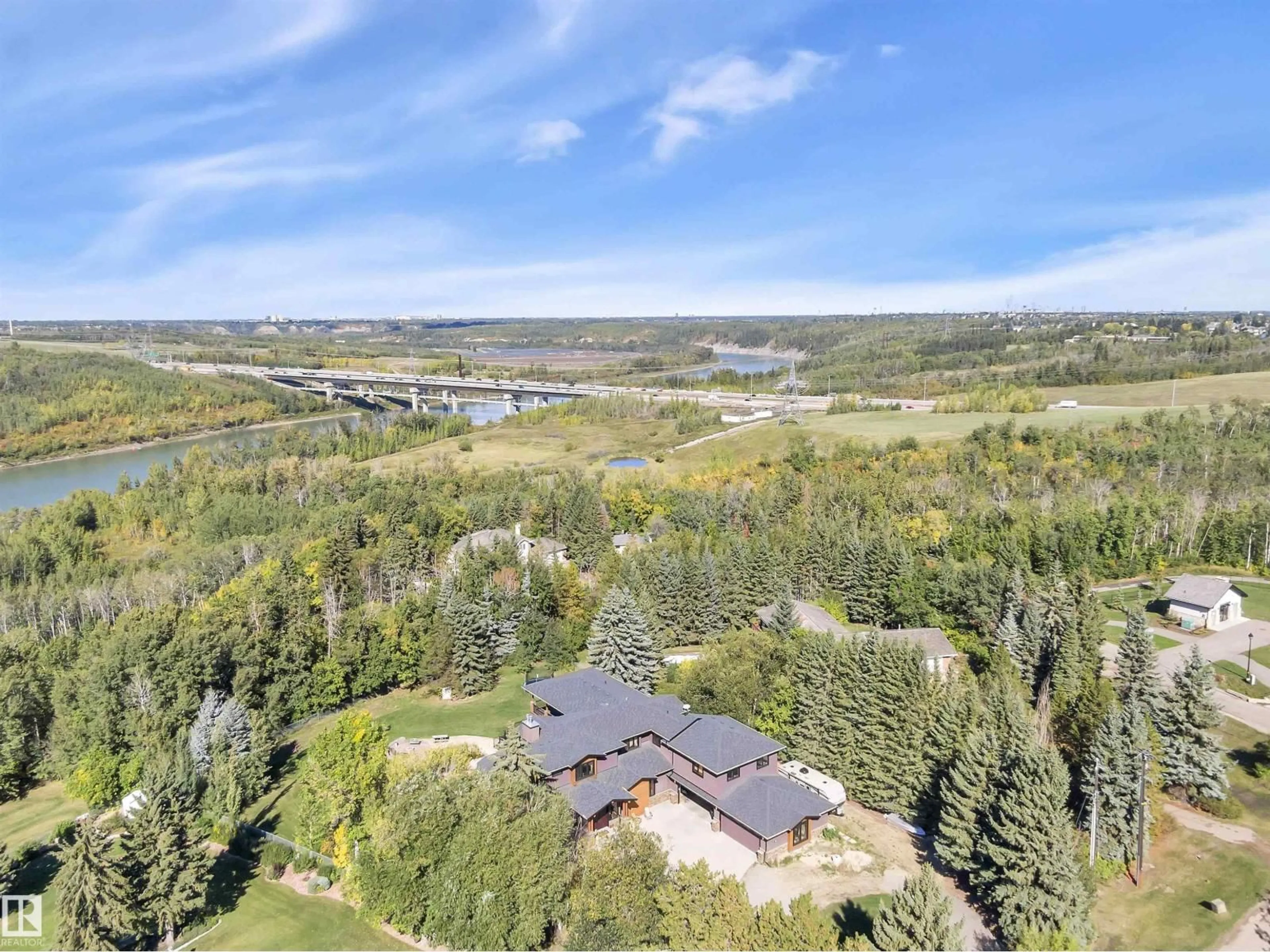 A pic from outside/outdoor area/front of a property/back of a property/a pic from drone, water/lake/river/ocean view for 148 WINDERMERE CR, Edmonton Alberta T6W0S3