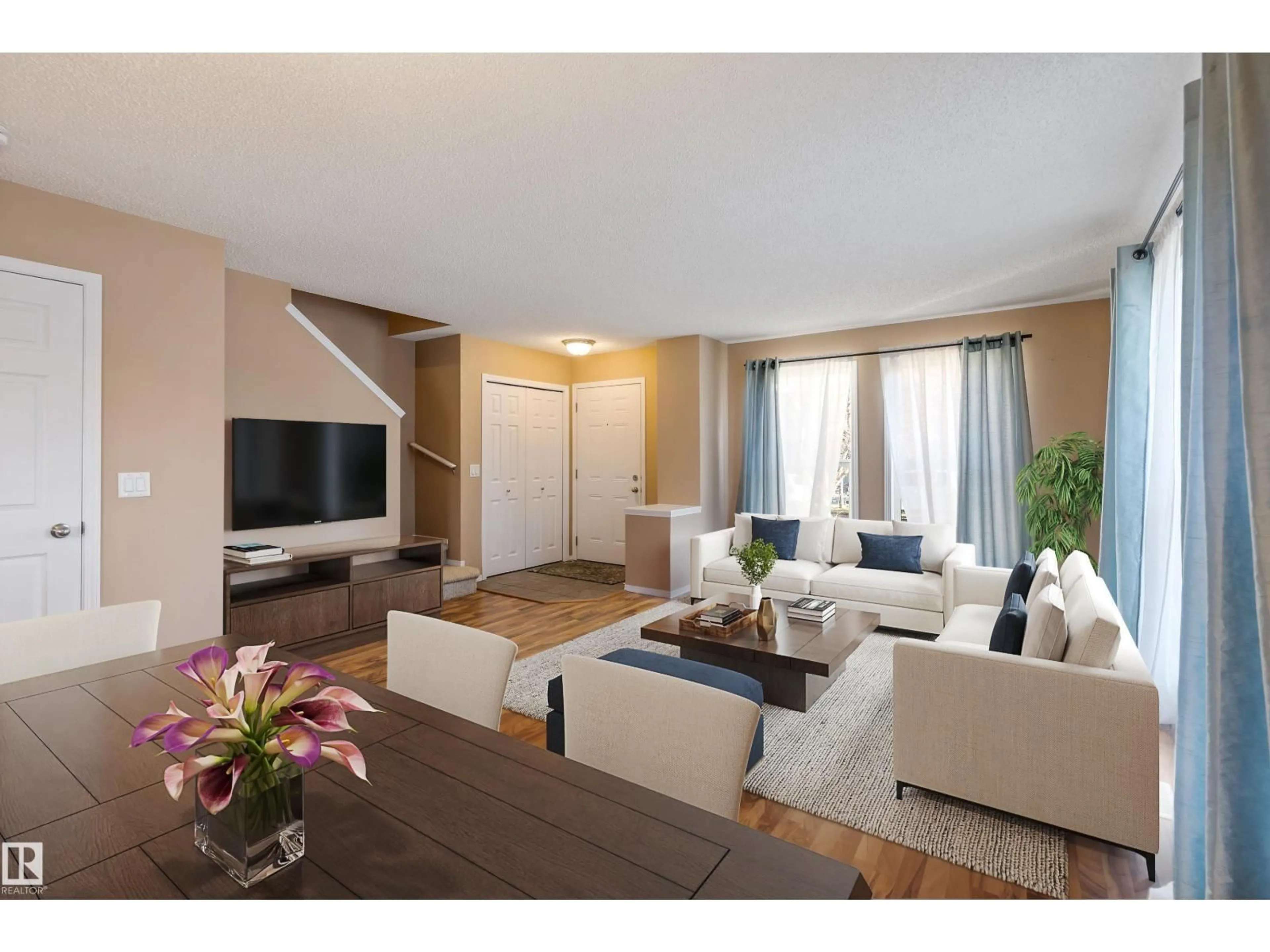 Living room with furniture, wood/laminate floor for 4826 TERWILLEGAR CM, Edmonton Alberta T6R3H7